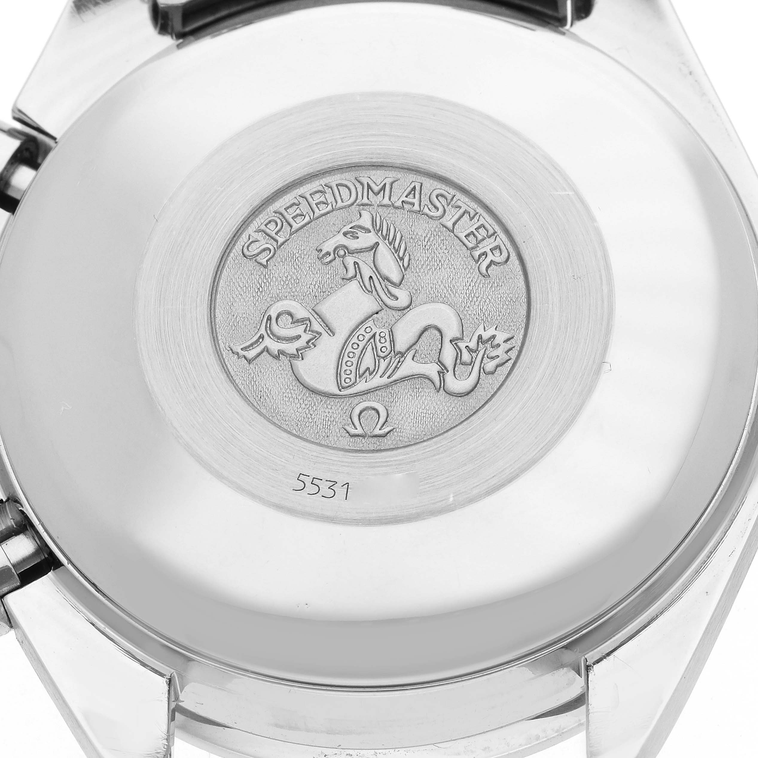 The image shows the case back of an Omega Speedmaster 3521.80.00 Men
s Stainless Steel Blue Dial watch with an engraved logo.