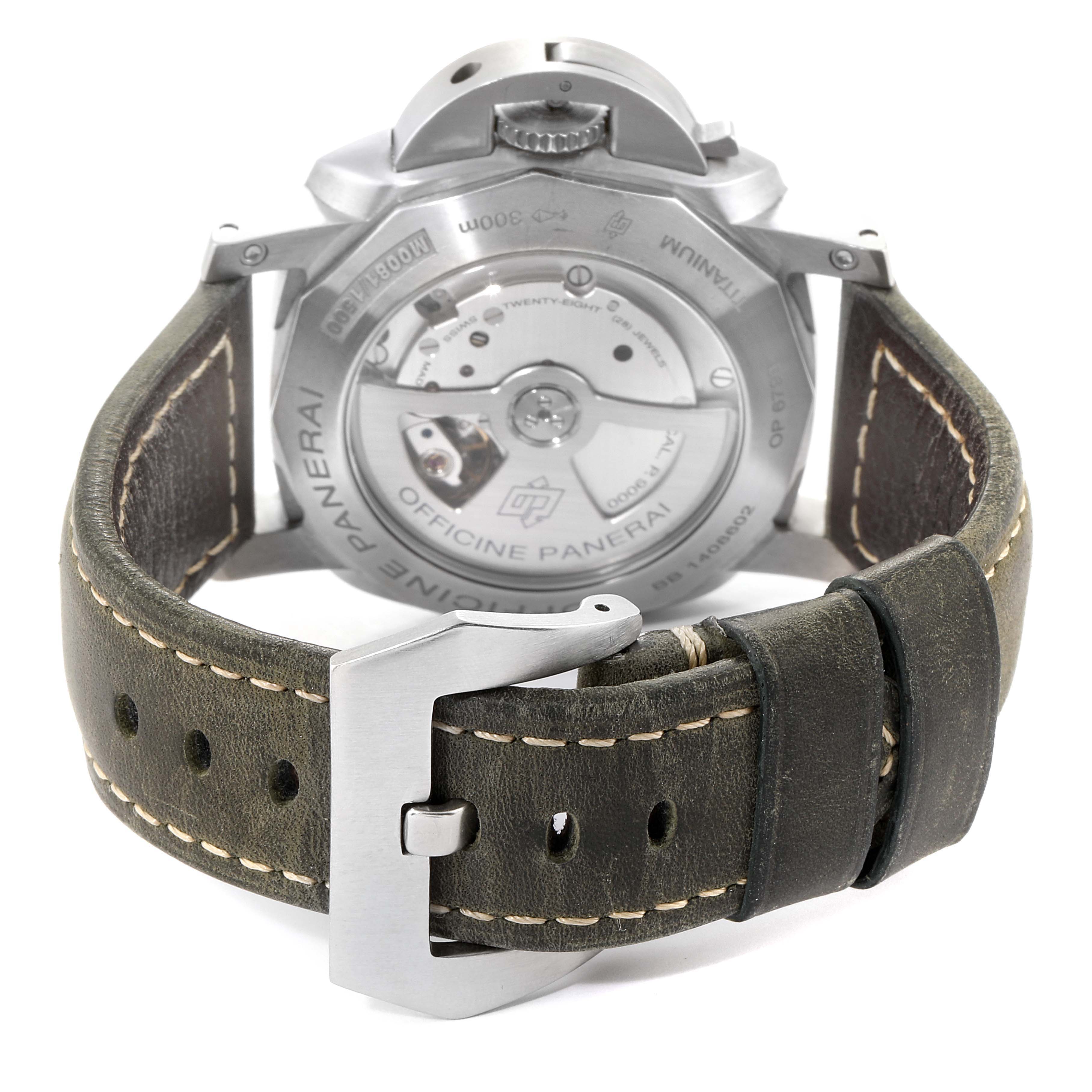 The image shows the back view of a Panerai Luminor PAM00351 Men
s Stainless Steel Black Dial PAM00351 Men
s Stainless Steel Black Dial watch focusing on the transparent case back and leather strap with buckle clasp.