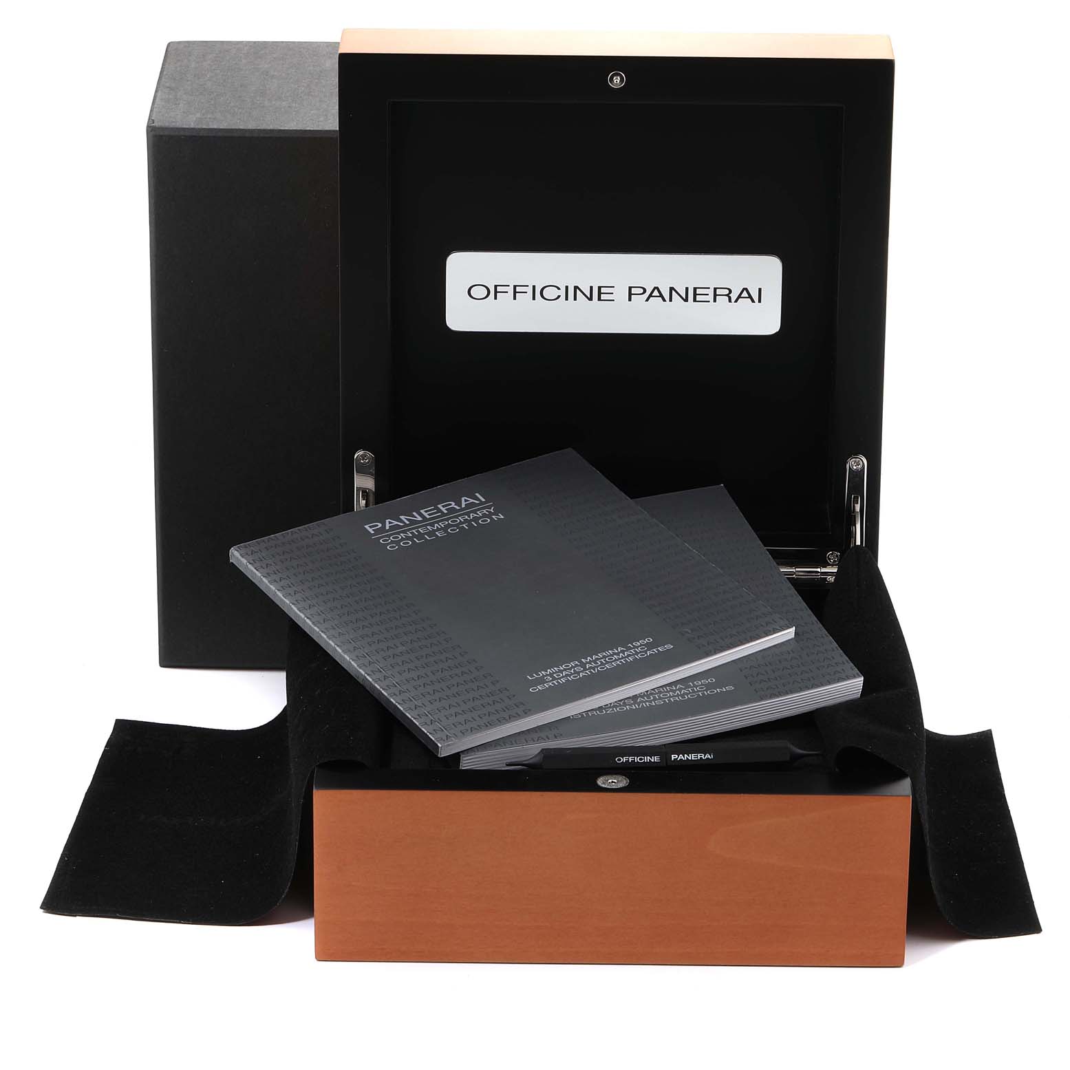 The image shows a Panerai Luminor PAM00351 Men
s Stainless Steel Black Dial PAM00351 Men
s Stainless Steel Black Dial watch box opened with accompanying manuals and accessories.