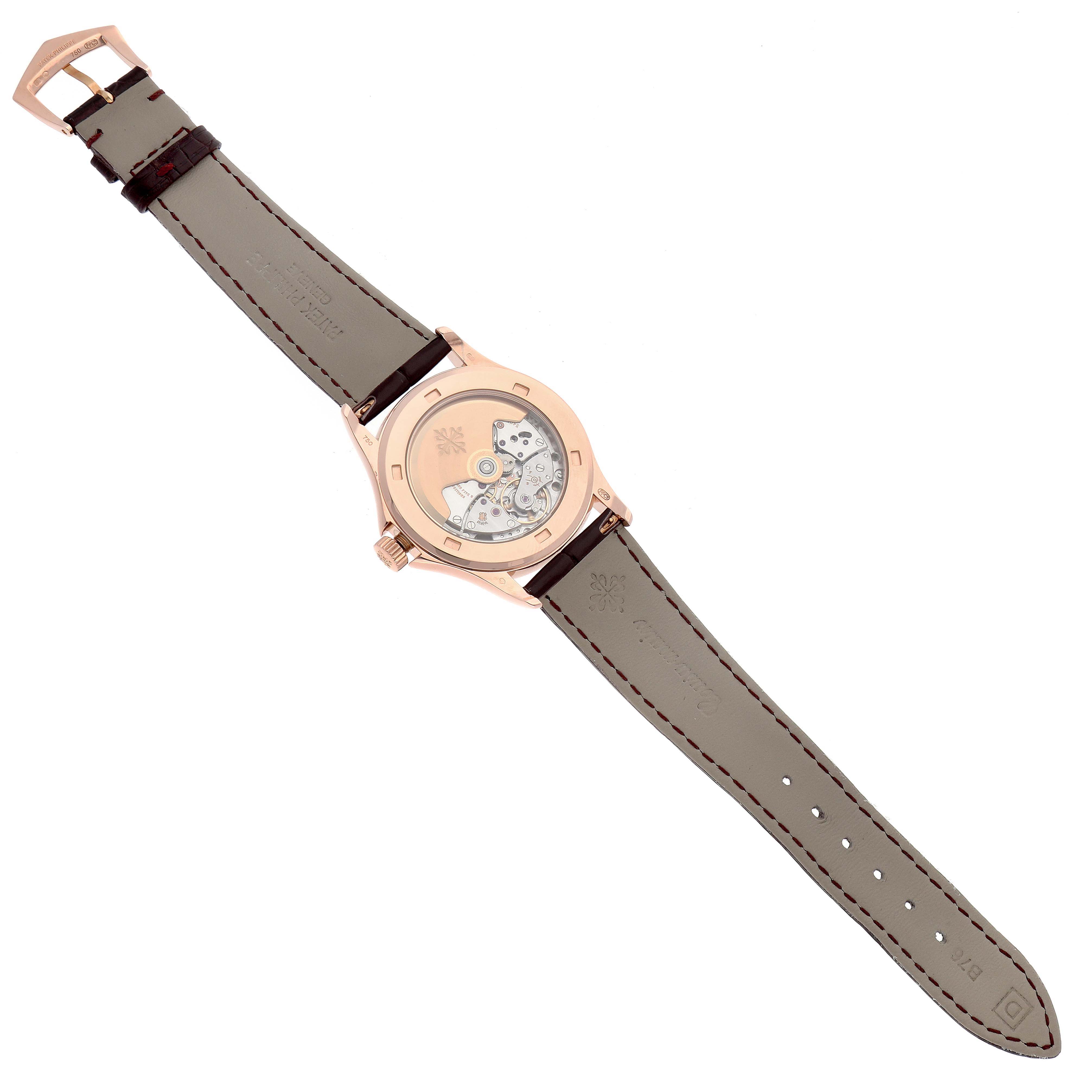 The image shows the back view of a Patek Philippe Calatrava 5127R-001 Men's Rose Gold Silver Dial 5127R-001 Men's Rose Gold Silver Dial watch, revealing the movement and inner mechanism.