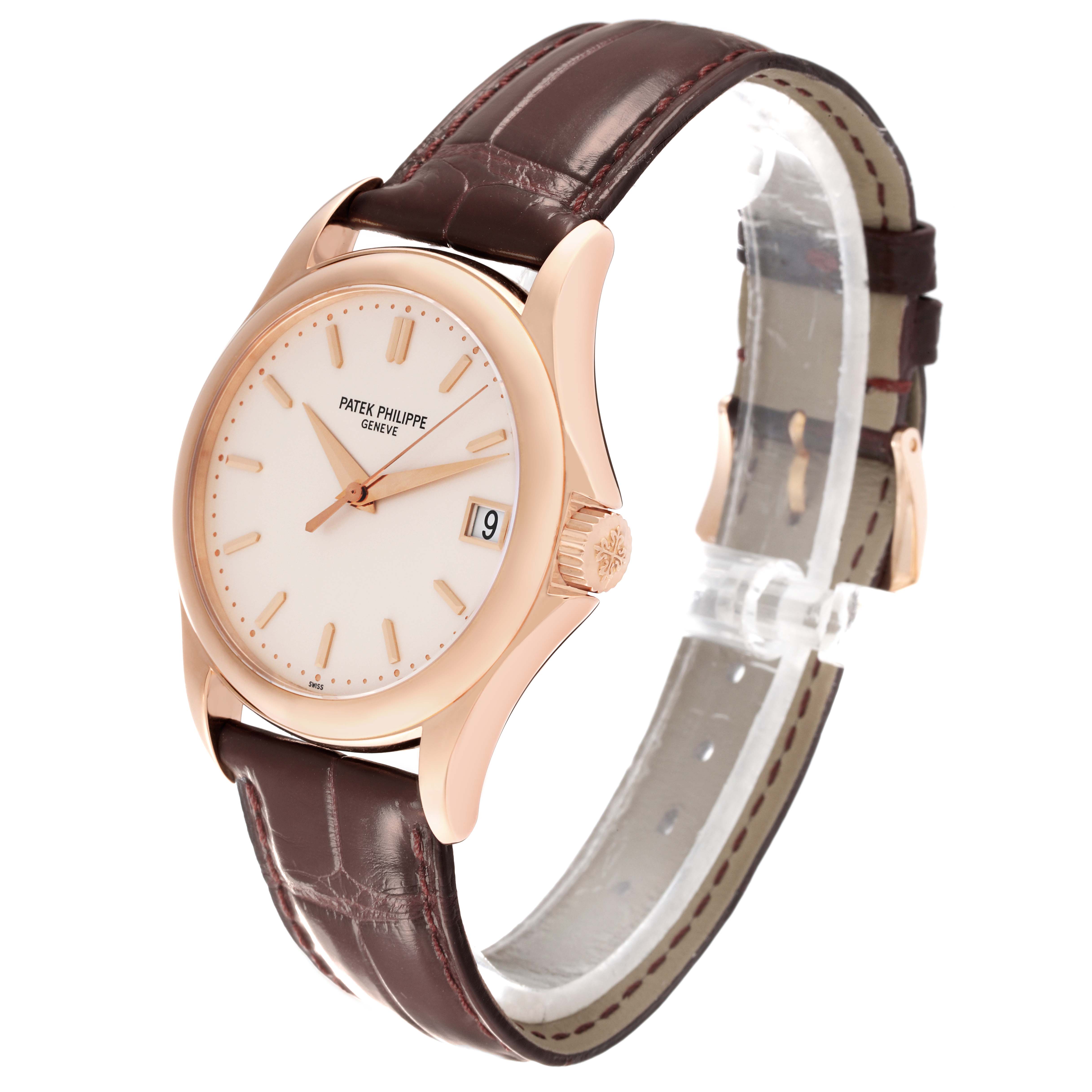 The Patek Philippe Calatrava 5127R-001 Men's Rose Gold Silver Dial 5127R-001 Men's Rose Gold Silver Dial watch is shown at a three-quarter angle highlighting its face, case, and leather strap.