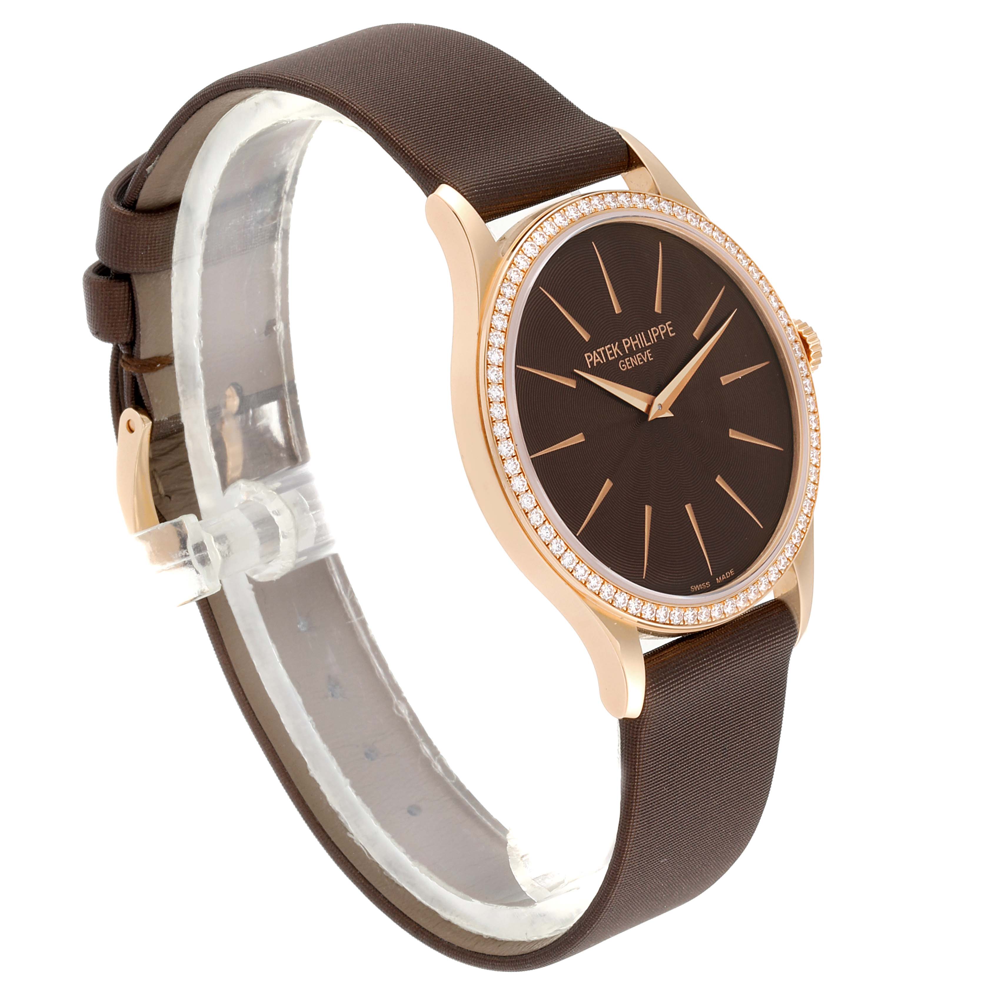 This is a side view of a Patek Philippe Calatrava 4897R-001 Women's Rose Gold Brown Dial 4897R-001 Women's Rose Gold Brown Dial watch, showcasing its brown dial, diamond bezel, and brown strap.