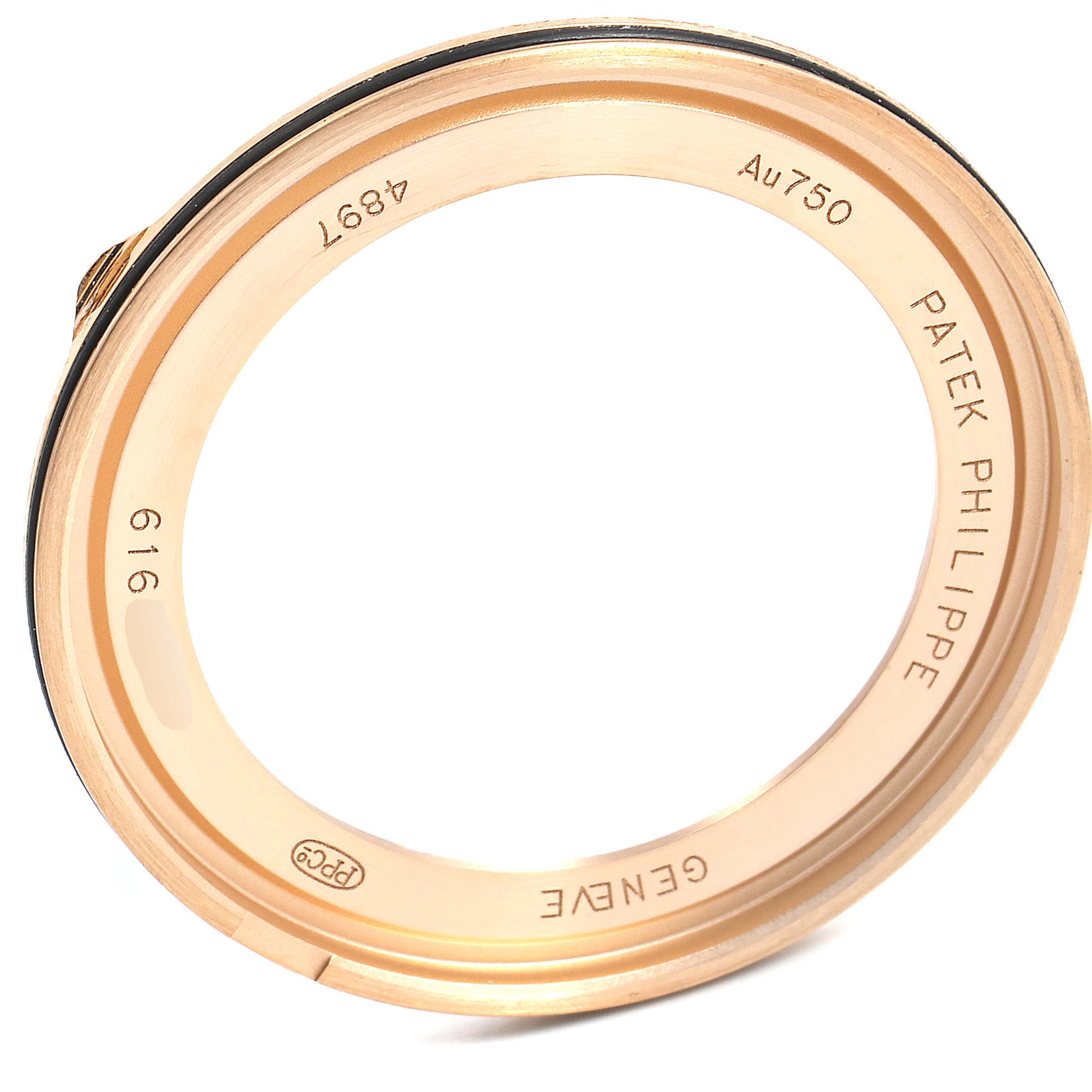 This image shows a close-up view of the gold bezel for the Patek Philippe Calatrava 4897R-001 Women's Rose Gold Brown Dial 4897R-001 Women's Rose Gold Brown Dial watch.