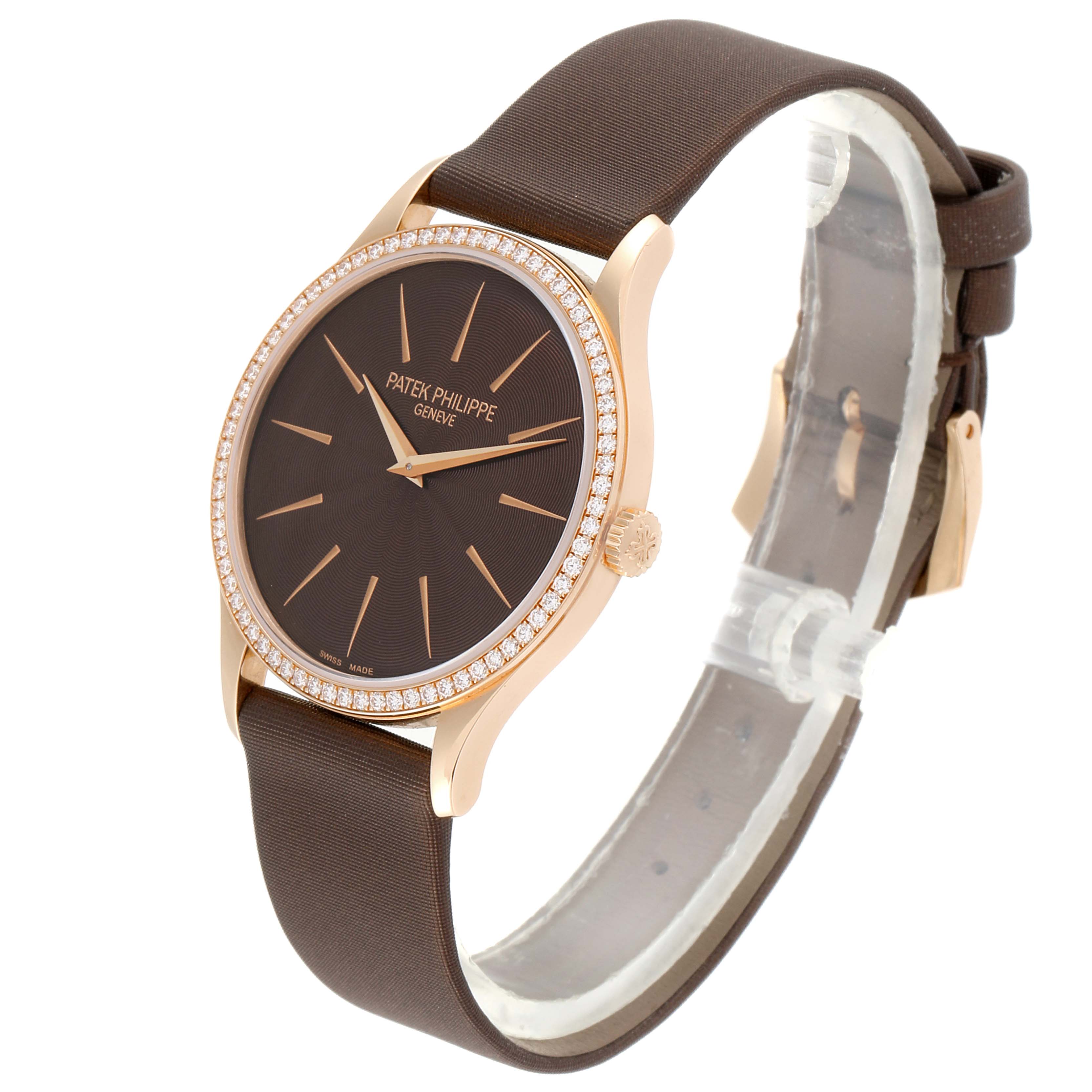 The image shows a side angle of the Patek Philippe Calatrava 4897R-001 Women's Rose Gold Brown Dial 4897R-001 Women's Rose Gold Brown Dial watch, highlighting the watch face, bezel, crown, and strap.