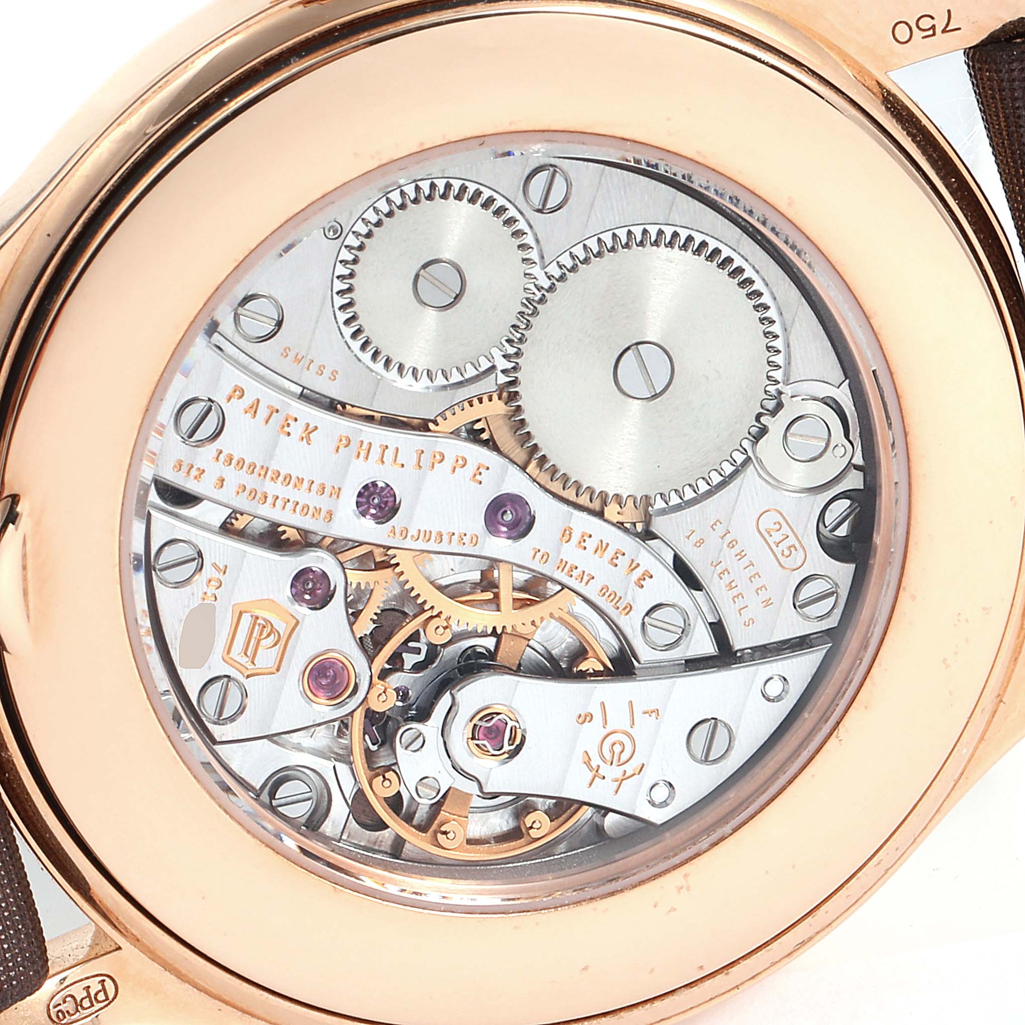 This image shows the back view of a Patek Philippe Calatrava 4897R-001 Women's Rose Gold Brown Dial 4897R-001 Women's Rose Gold Brown Dial watch, revealing its intricate mechanical movement.