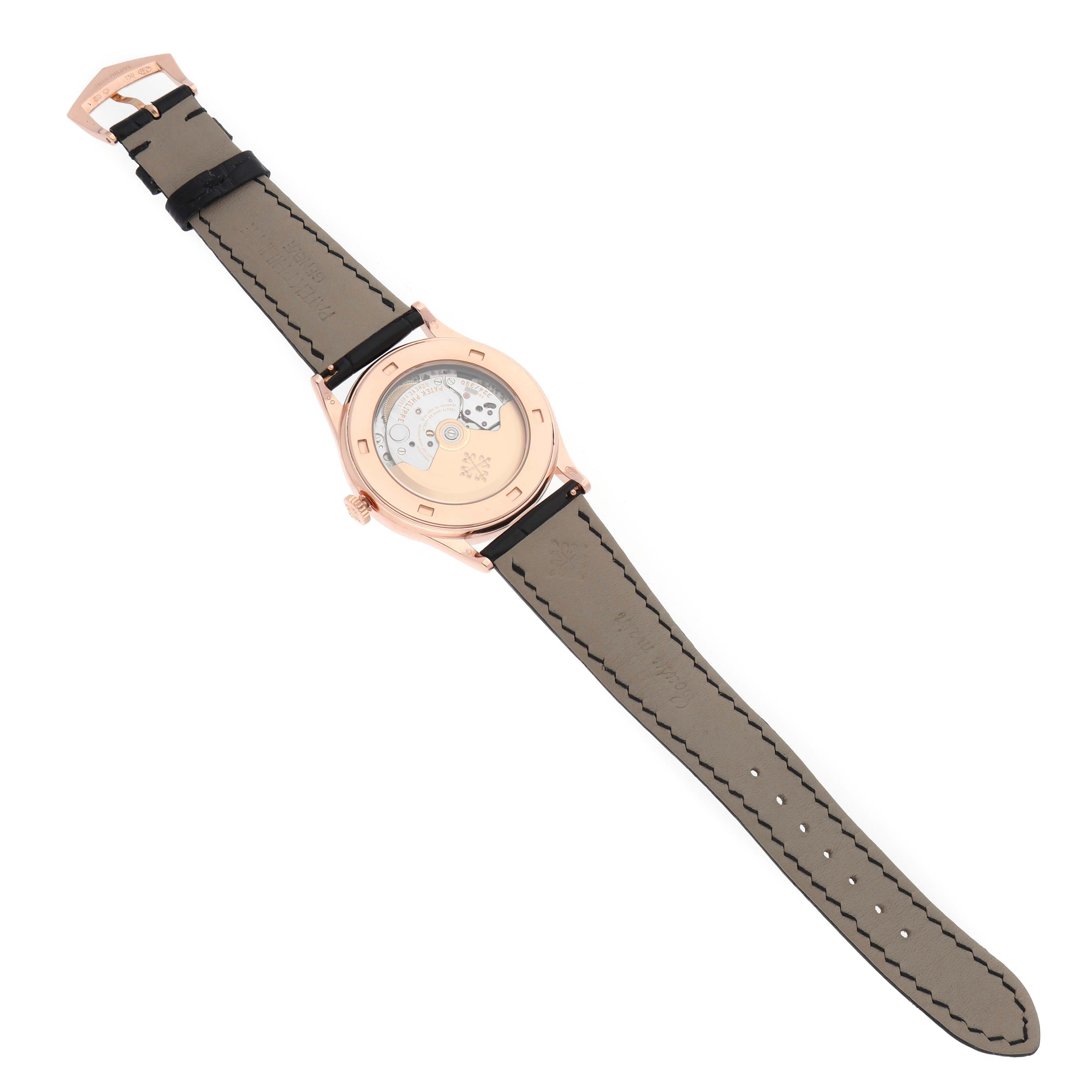 This image shows the back view of a Patek Philippe Calatrava 5296R-010 Men's Rose Gold Silver Dial 5296R-010 Men's Rose Gold Silver Dial watch, highlighting its movement and strap.