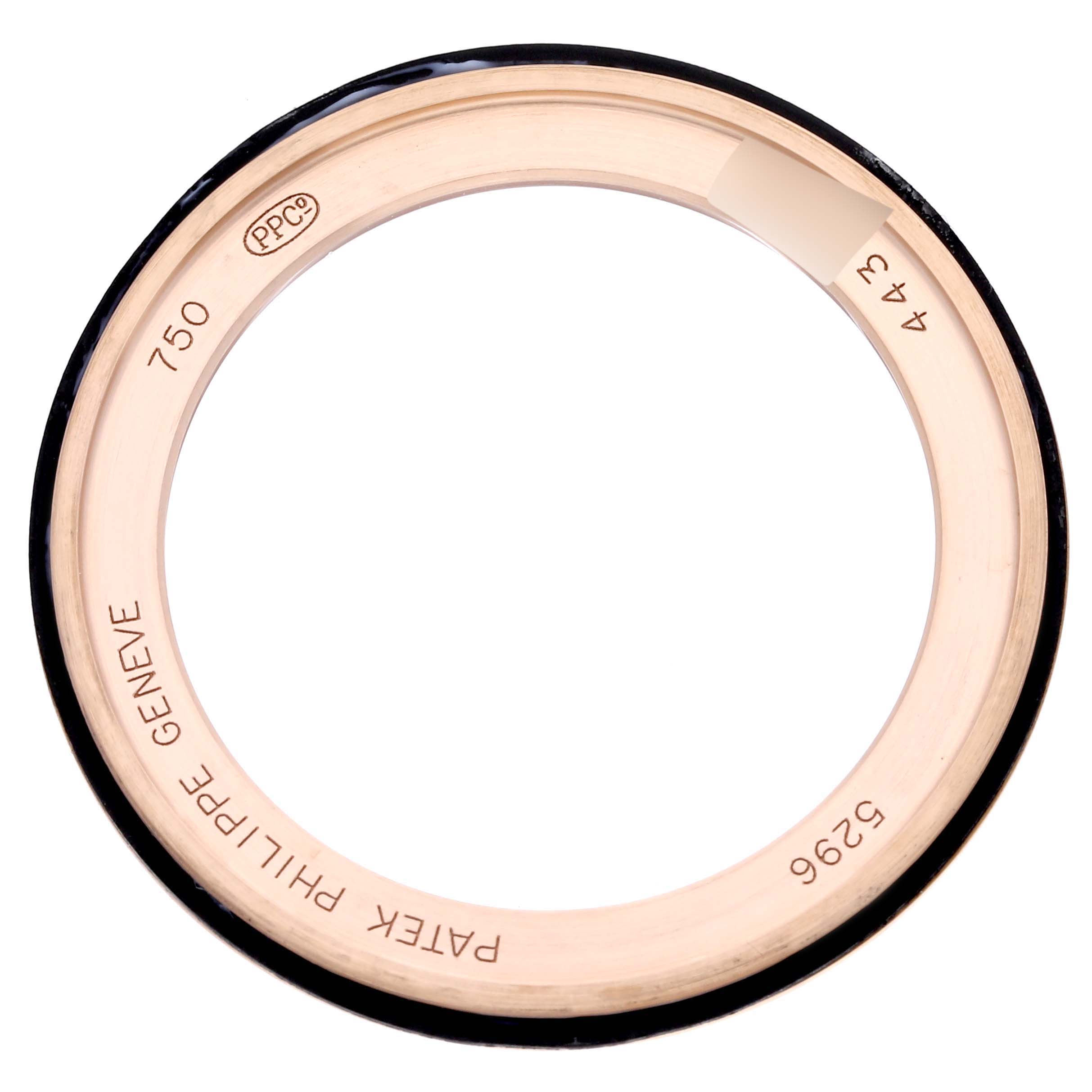 This image shows a case back ring of the Patek Philippe Calatrava 5296R-010 Men's Rose Gold Silver Dial 5296R-010 Men's Rose Gold Silver Dial watch from a top-down angle.