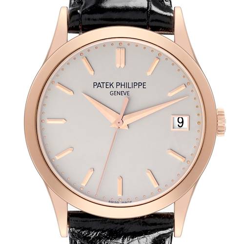 The image shows a front view of a Patek Philippe Calatrava watch, highlighting the dial, hands, markers, and date window.