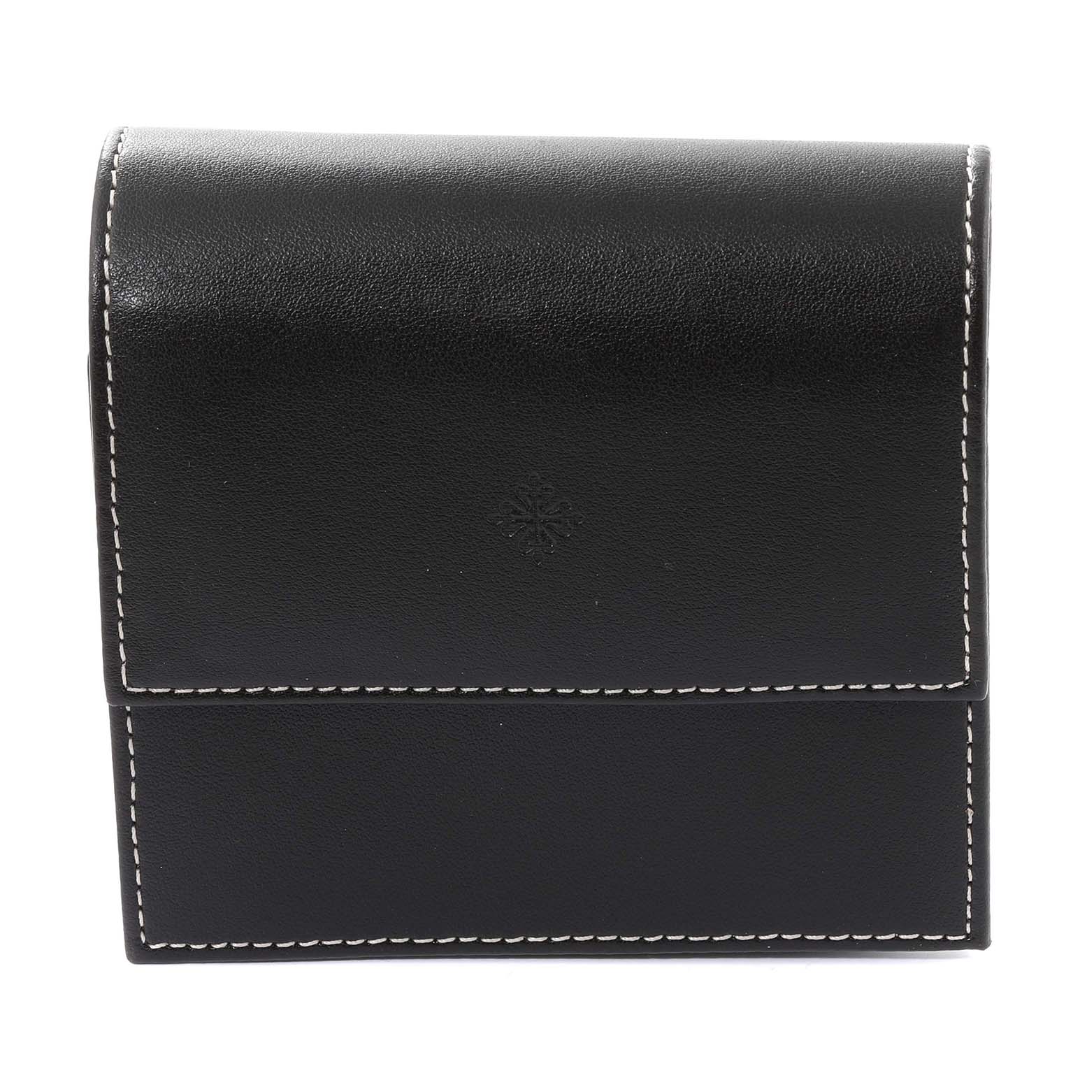 The image shows a black leather case with white stitching for storing the Patek Philippe Calatrava 5296R-010 Men's Rose Gold Silver Dial 5296R-010 Men's Rose Gold Silver Dial watch.