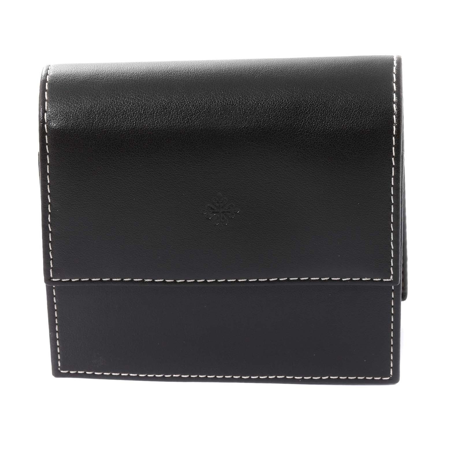 This image shows a closed leather case for the Calatrava model by Patek Philippe from a straight front angle.