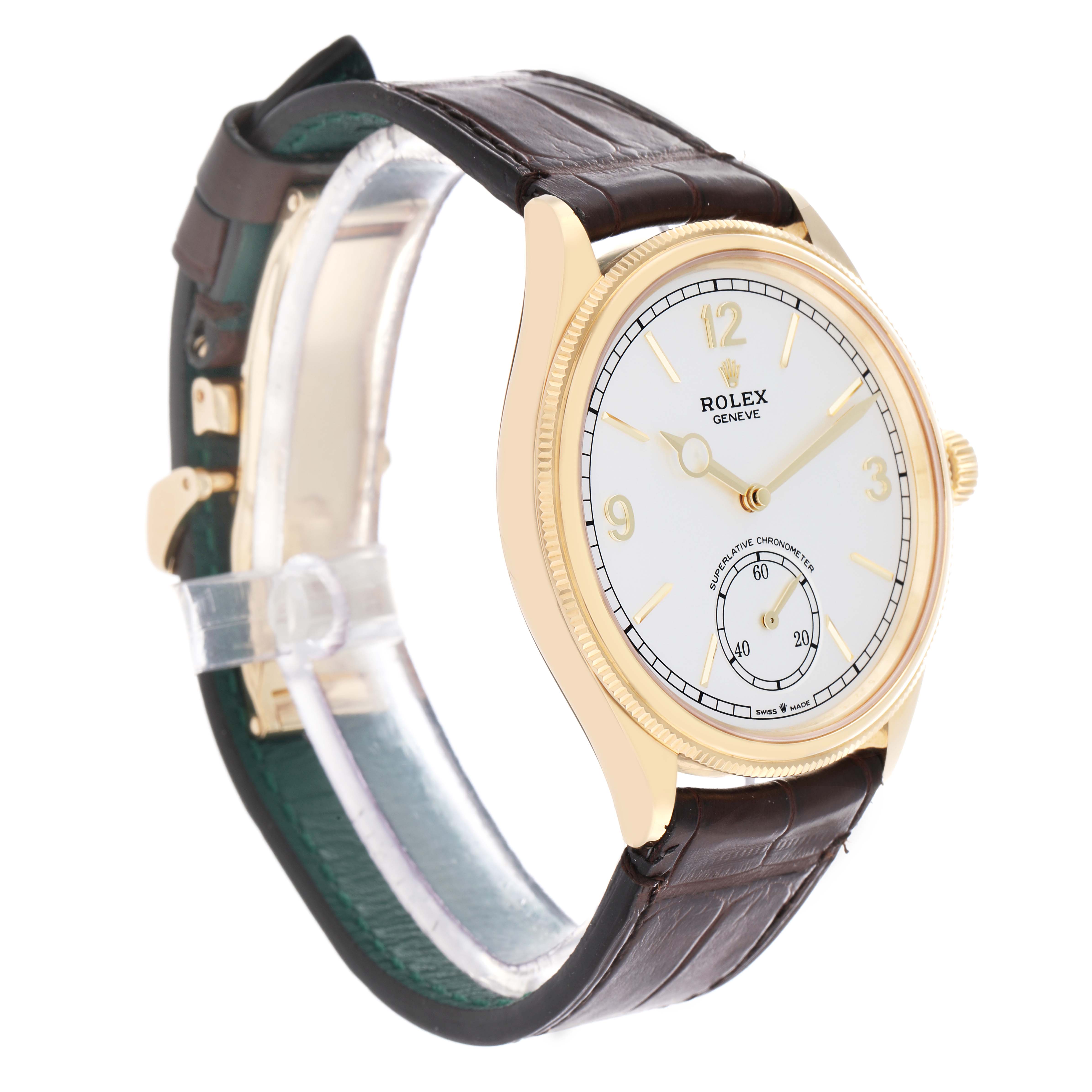 The Rolex 1908 52508-0006 Men
s Yellow Gold White Dial watch is shown at a three-quarter angle, highlighting its gold case, white dial, and brown leather strap.