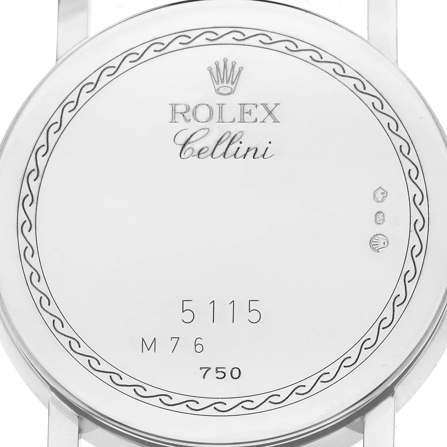 The image shows the case back of a Rolex Cellini 5115 Men
s White Gold Silver Dial watch, featuring engravings and a decorative border.