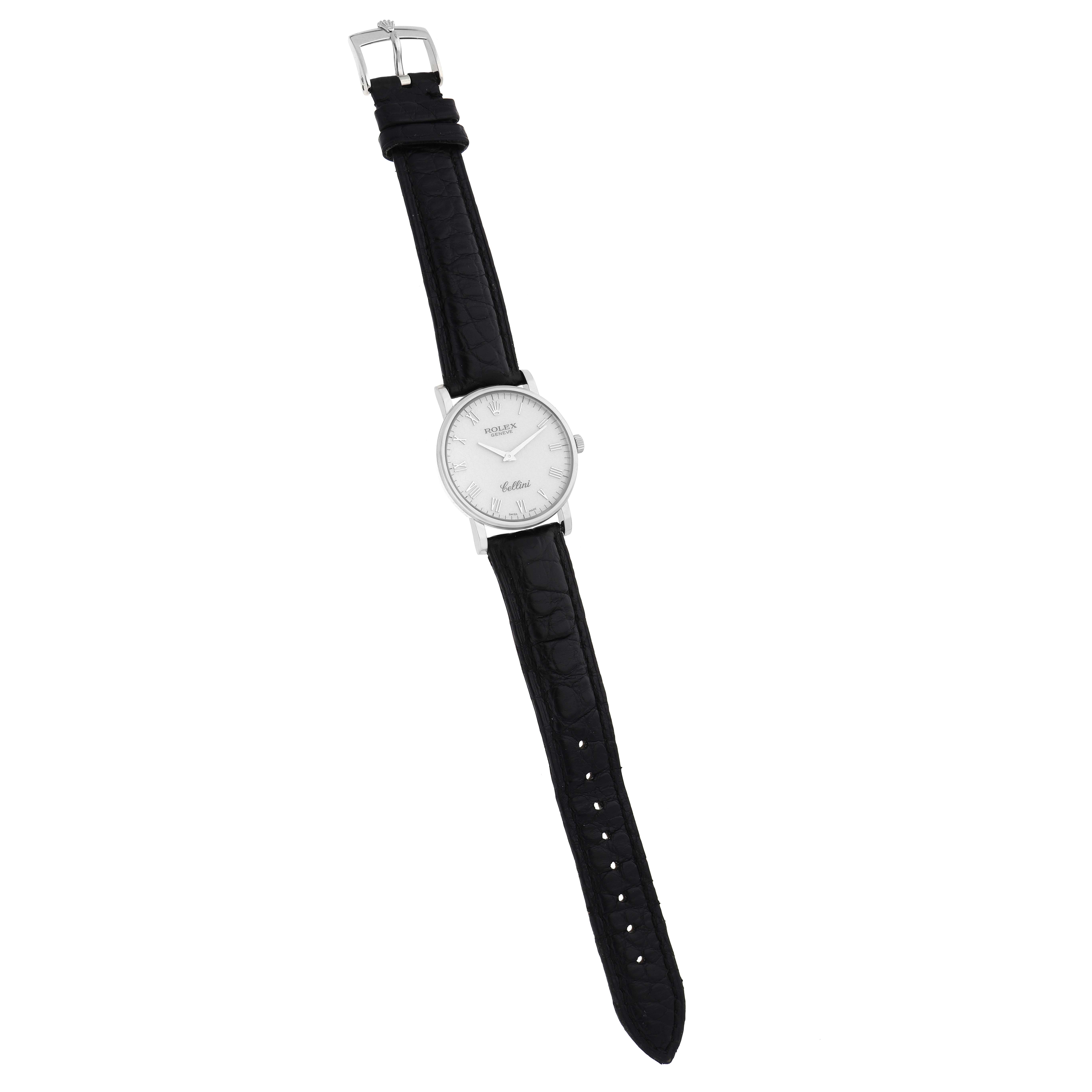 The Rolex Cellini 5115 Men
s White Gold Silver Dial watch is shown from the front, displaying its dial, case, and black leather strap.