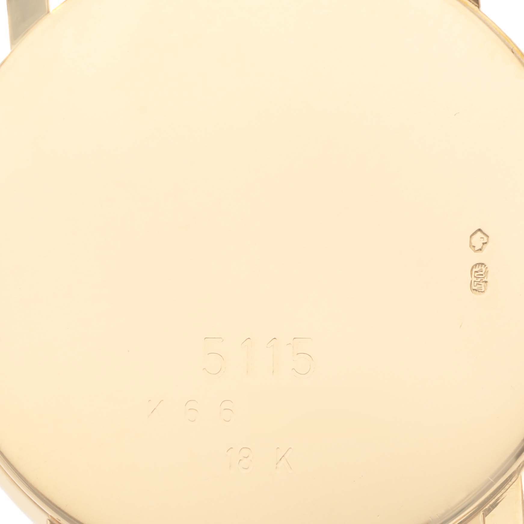 The image shows the back case of a Rolex Cellini 5115 Men's Yellow Gold Silver Dial 5115 Men's Yellow Gold Silver Dial watch with model and hallmark engravings.