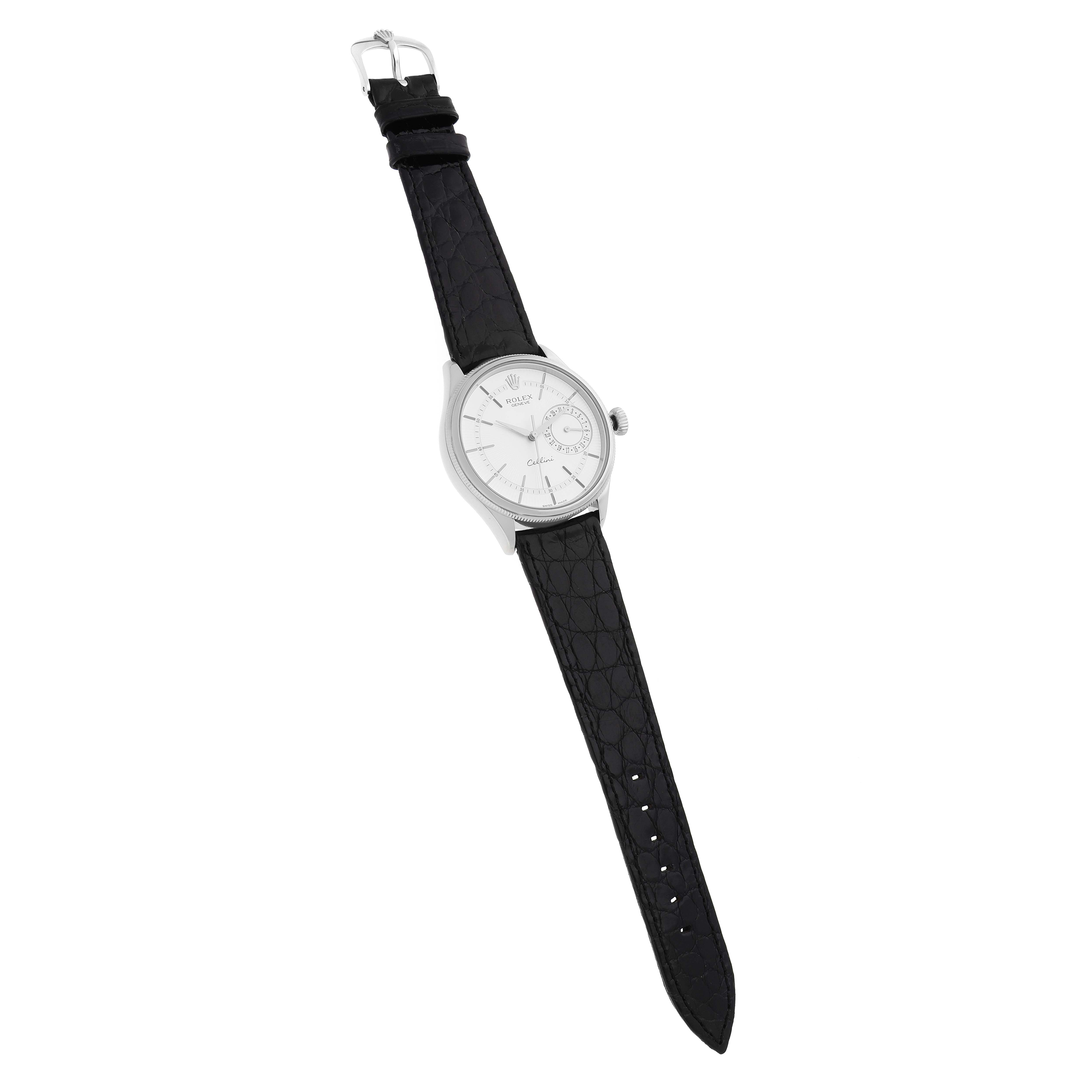 The Rolex Cellini 50519 Men
s White Gold White Dial watch is shown from a top-down angle, displaying the face, case, and black leather strap.