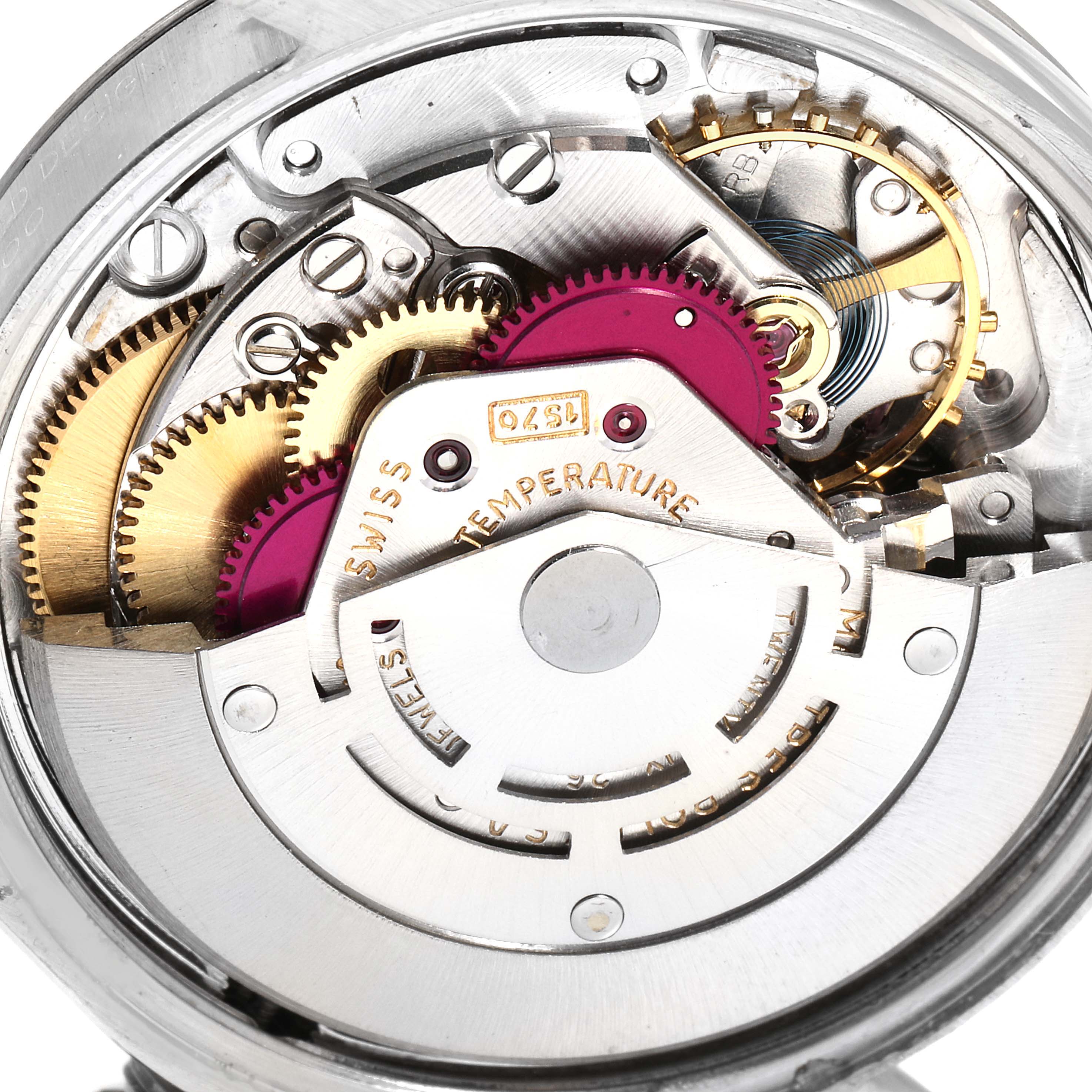 This image shows a close-up view of the internal movement and gears of the Rolex Date 1500 Men's Stainless Steel Grey Dial 1500 Men's Stainless Steel Grey Dial watch model.