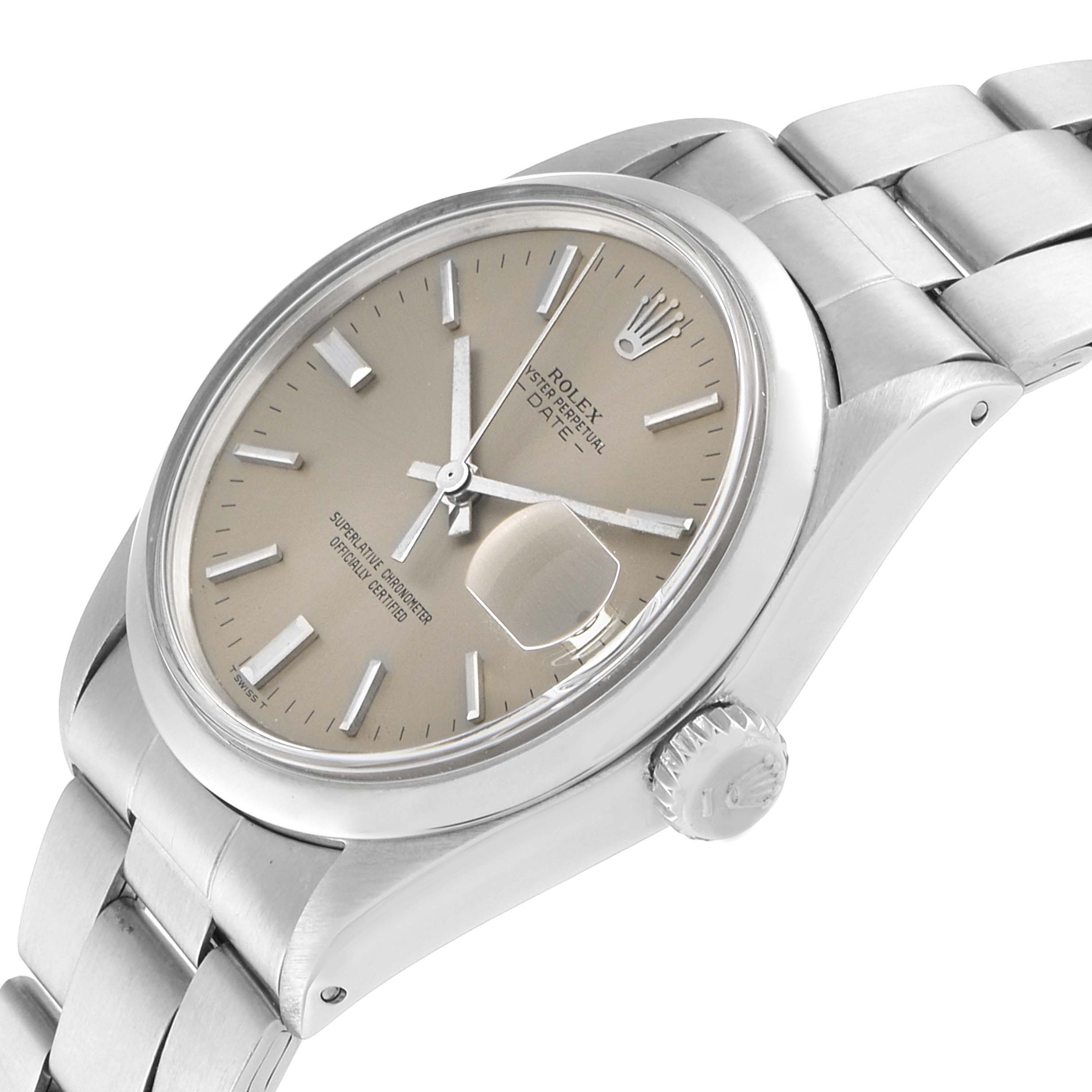 The image shows a Rolex Date 1500 Men's Stainless Steel Grey Dial 1500 Men's Stainless Steel Grey Dial model watch from a side angle, highlighting the face, bezel, crown, and bracelet.