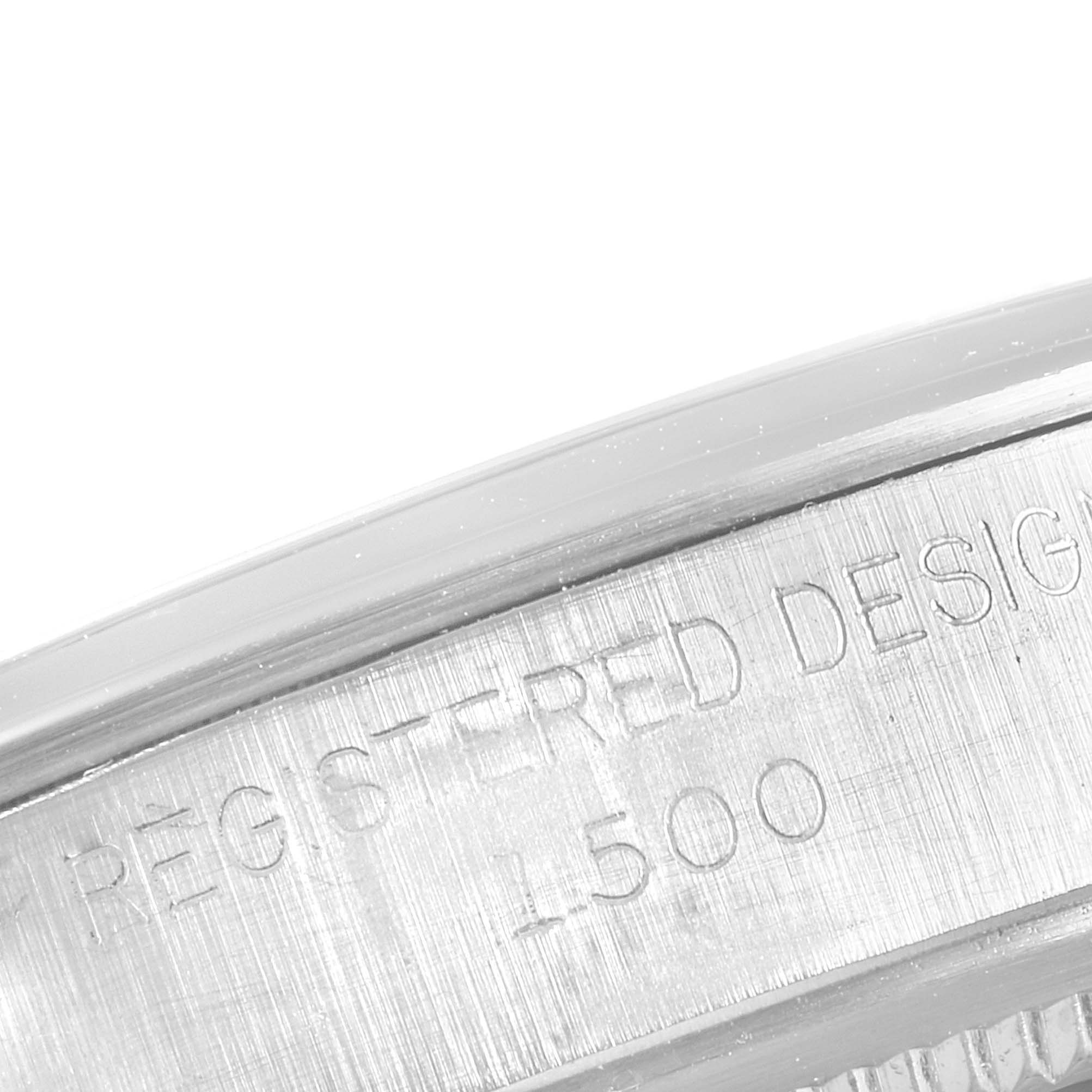 The image shows a close-up of the serial number engraving on the Rolex Date 1500 Men's Stainless Steel Grey Dial 1500 Men's Stainless Steel Grey Dial model 1500 watch case.