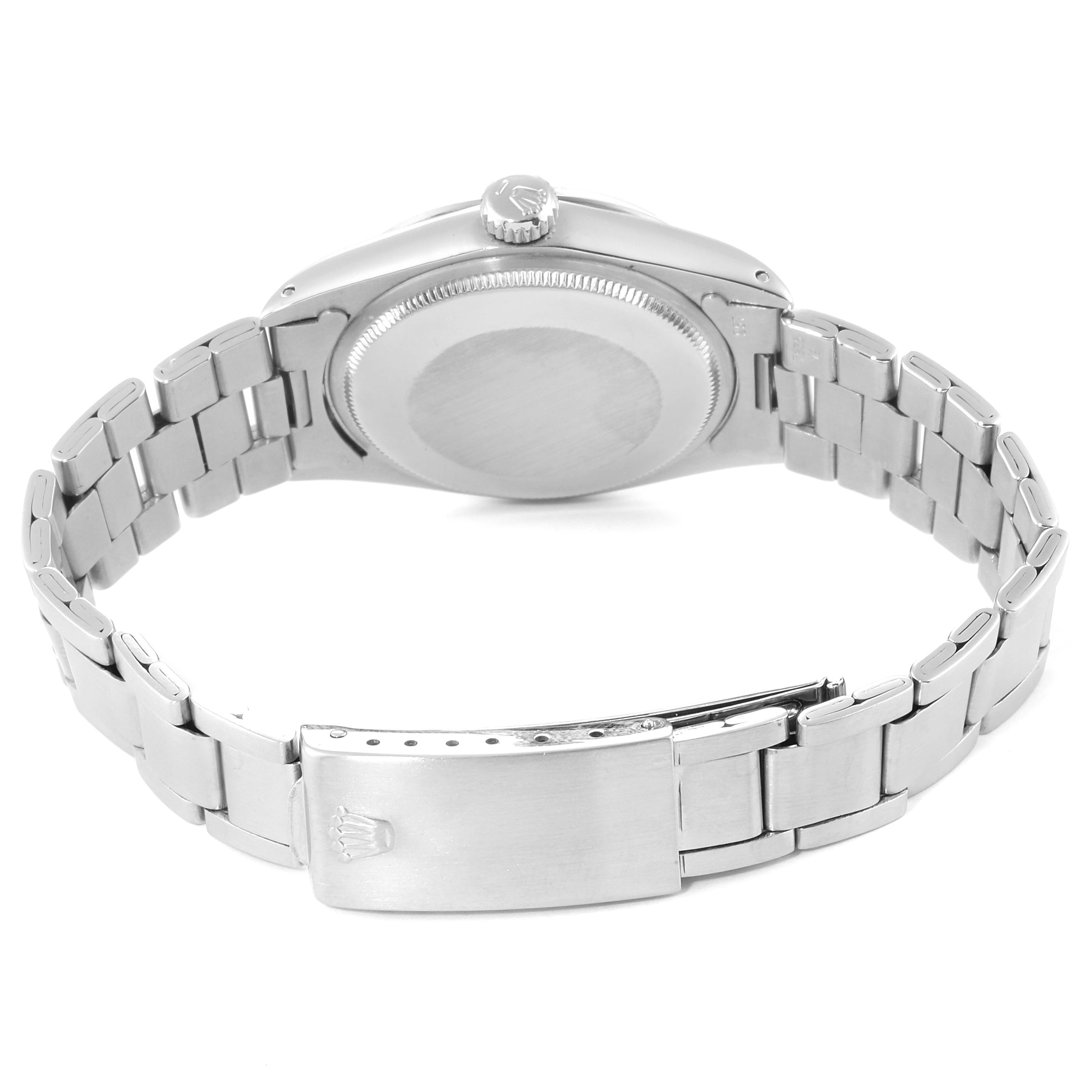 This Rolex Date 1500 Men's Stainless Steel Grey Dial 1500 Men's Stainless Steel Grey Dial model watch is shown from the case back and bracelet clasp side.