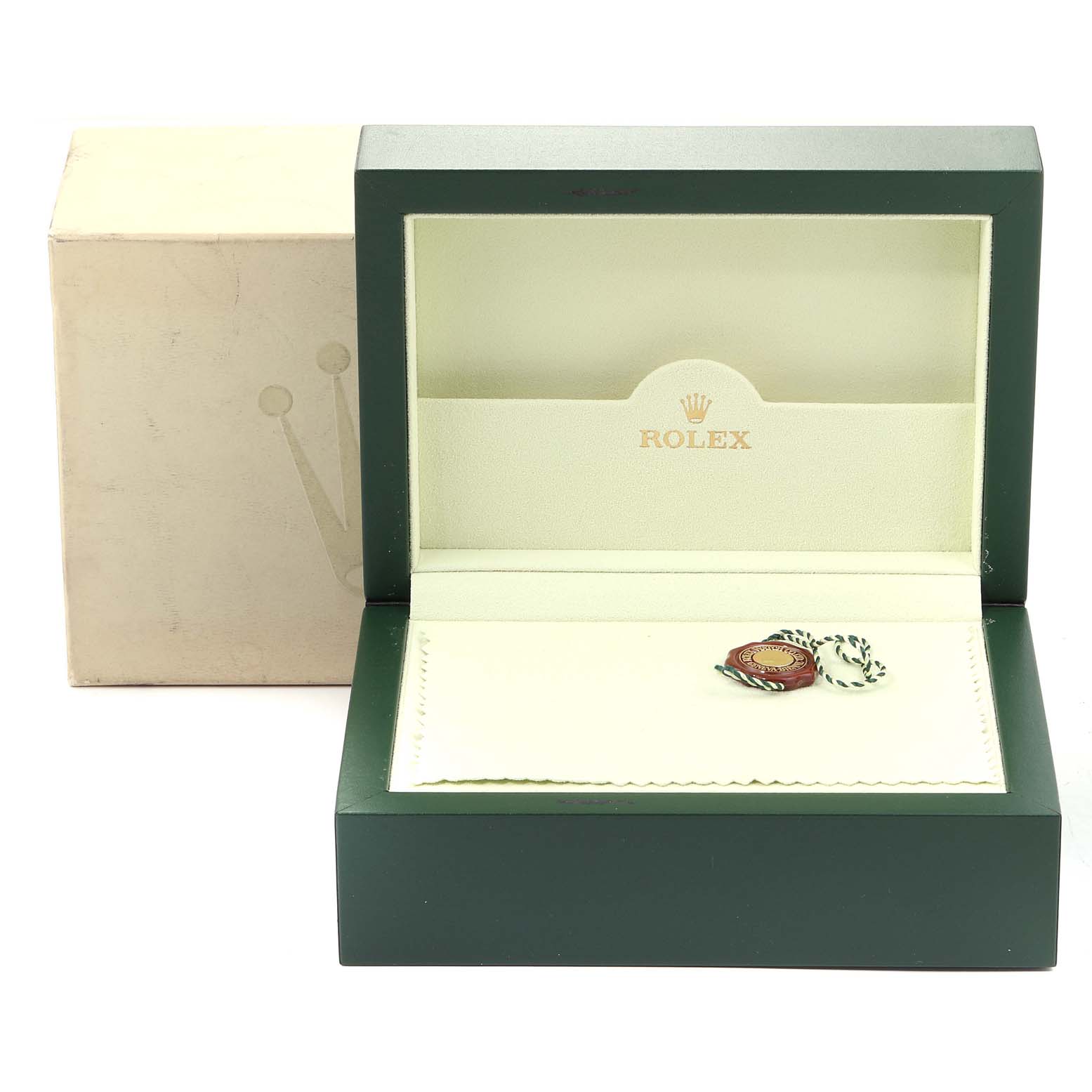 This image shows the interior and exterior of a green Rolex box for the Date model, with Rolex branding visible inside.