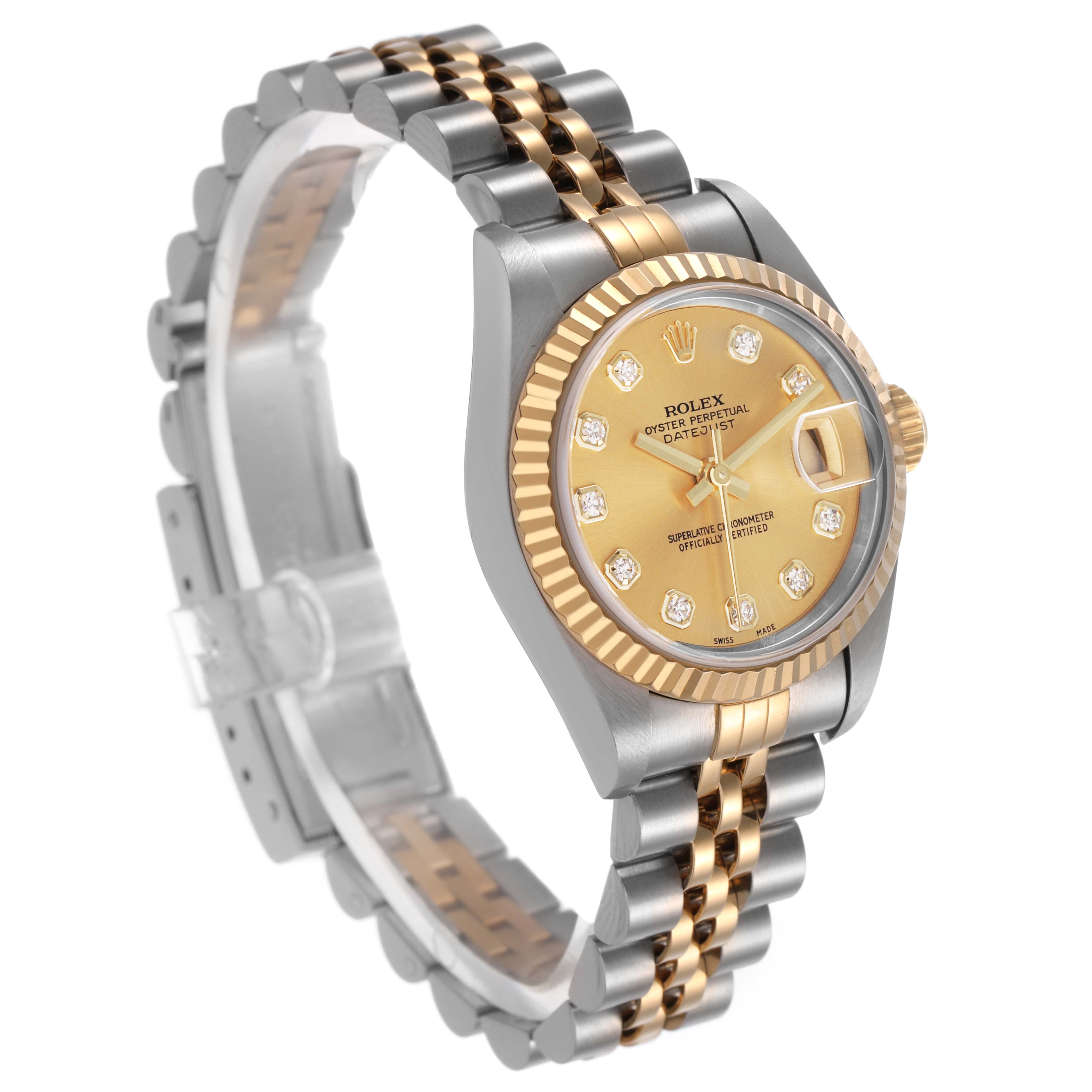 The Rolex Datejust 79173 Women's Stainless Steel Champagne Dial watch is shown at a slight angle highlighting its gold dial, fluted bezel, and two-tone Jubilee bracelet.