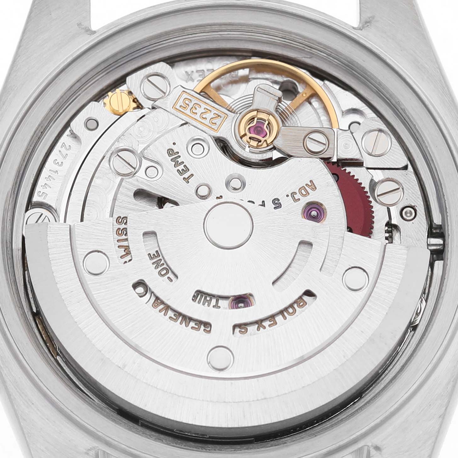 The image shows the back view of the Rolex Datejust 79173 Women's Stainless Steel Champagne Dial movement, highlighting internal mechanisms and gears.