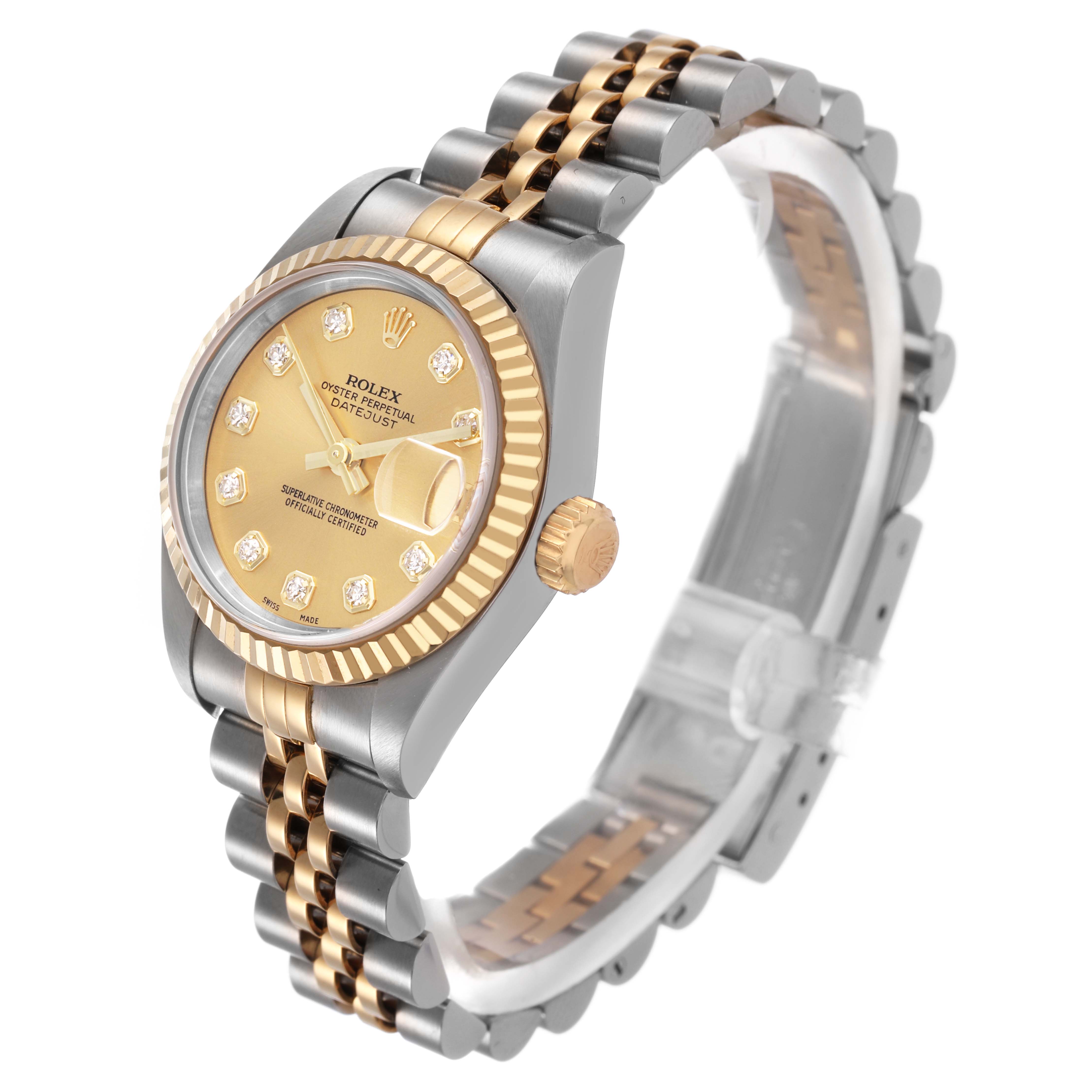 The Rolex Datejust 79173 Women's Stainless Steel Champagne Dial watch is shown from a three-quarter angle, highlighting the face, bezel, crown, and bracelet.