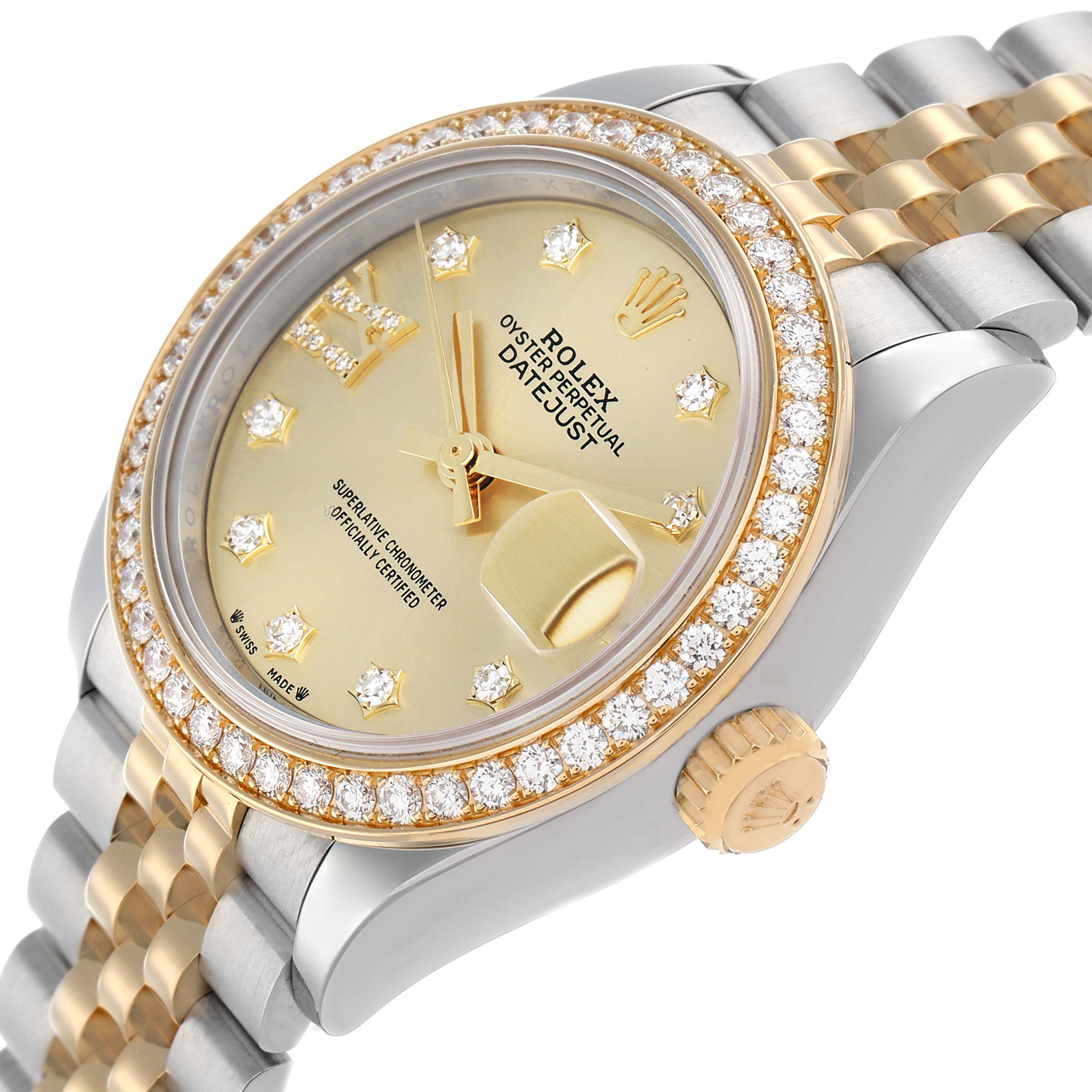 The Rolex Datejust 279383 Women
s Steel and Gold (two tone) Champagne Dial watch is shown from an angled side view, highlighting the diamond-set bezel, crown, dial, and part of the bracelet.