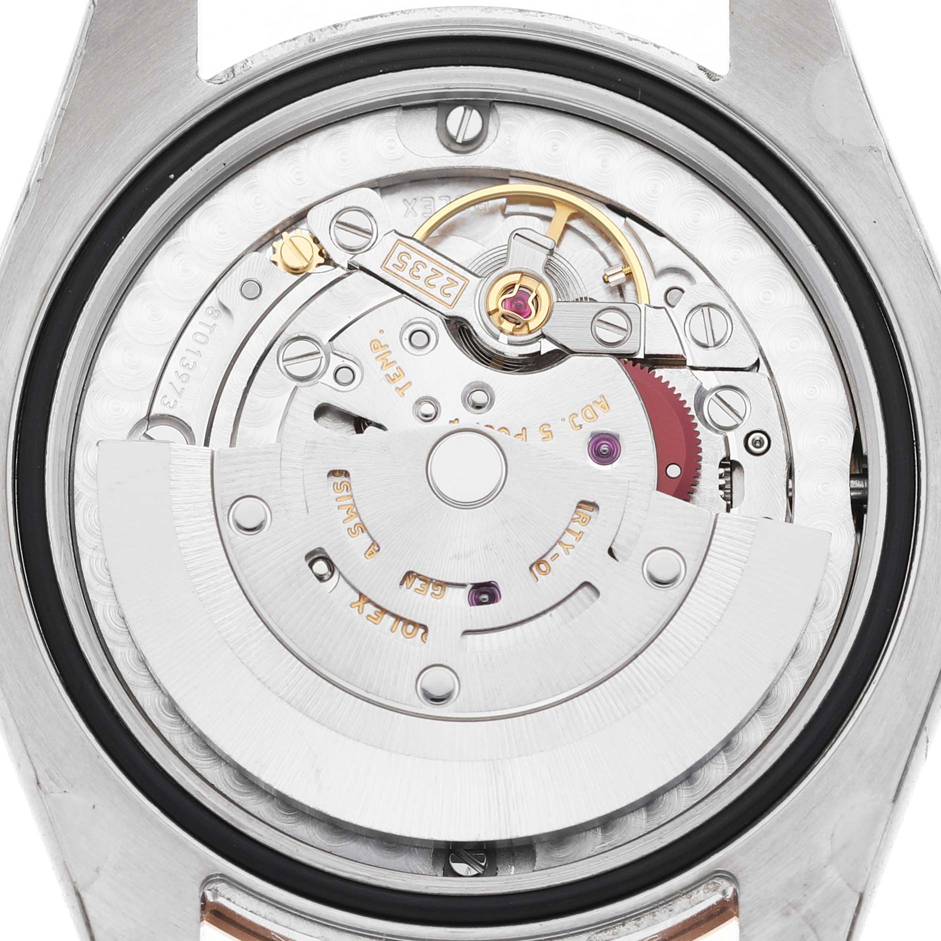 The image shows the movement inside a Rolex Datejust 178271 Women's Stainless Steel White Dial, highlighting its rotor and mechanical components from a top-down view.
