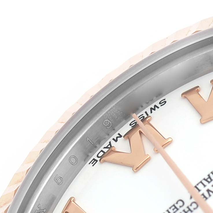The image shows a partial view of the Rolex Datejust 178271 Women's Stainless Steel White Dial watch, focusing on the dial, Roman numeral markers, and fluted bezel.