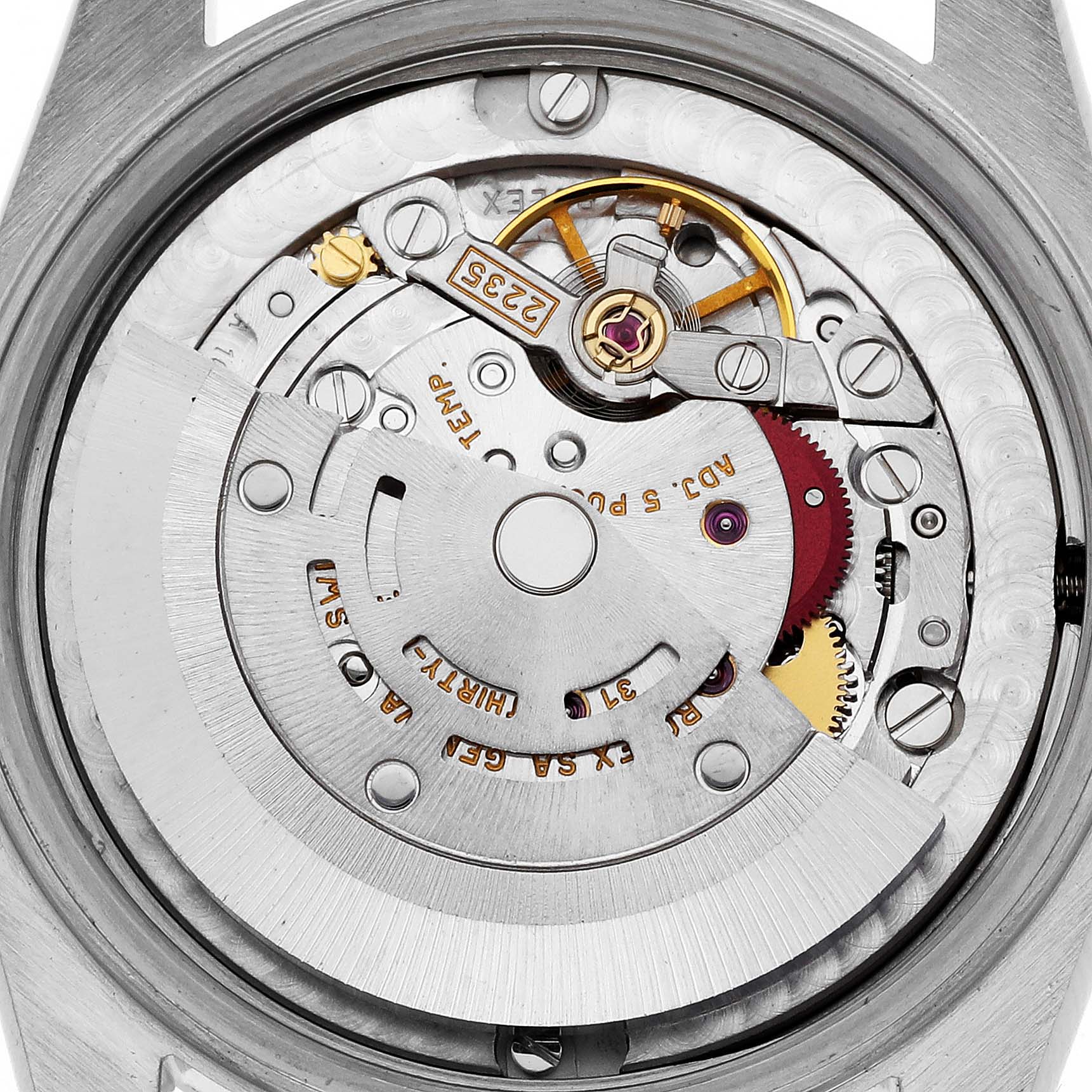 The image shows a close-up view of the movement mechanism inside a mid-size Rolex watch case, taken from the back.