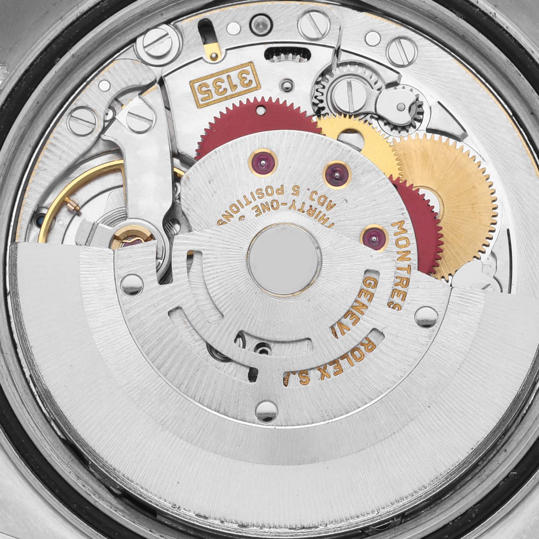 The image shows a close-up view of the internal movement components of a Rolex Datejust 16233 Men's Steel and Gold (two tone) Black Dial 16233 Men's Steel and Gold (two tone) Black Dial watch.