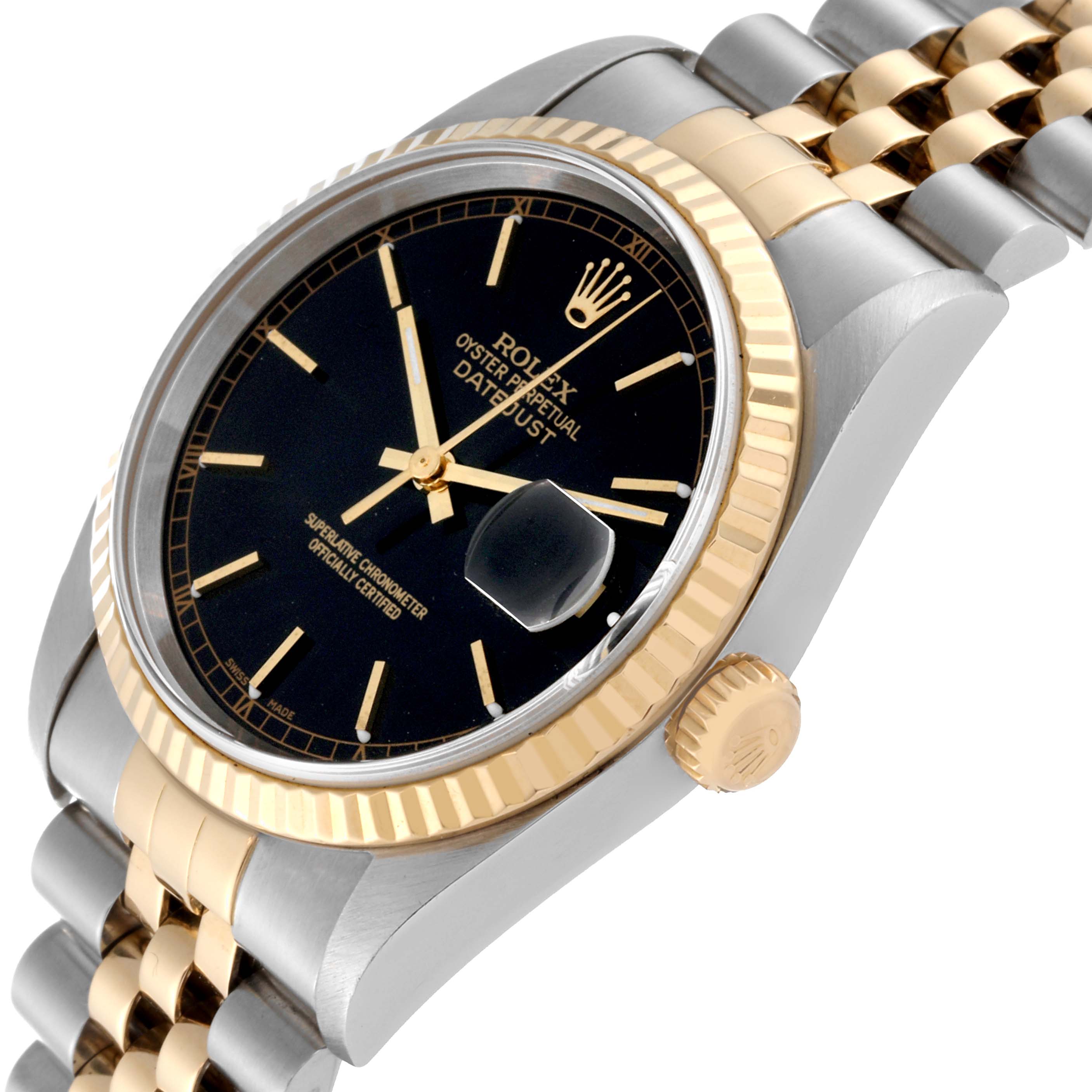 The Rolex Datejust 16233 Men's Steel and Gold (two tone) Black Dial 16233 Men's Steel and Gold (two tone) Black Dial watch is shown at an angled close-up, highlighting the face, fluted bezel, crown, and part of the Jubilee bracelet.