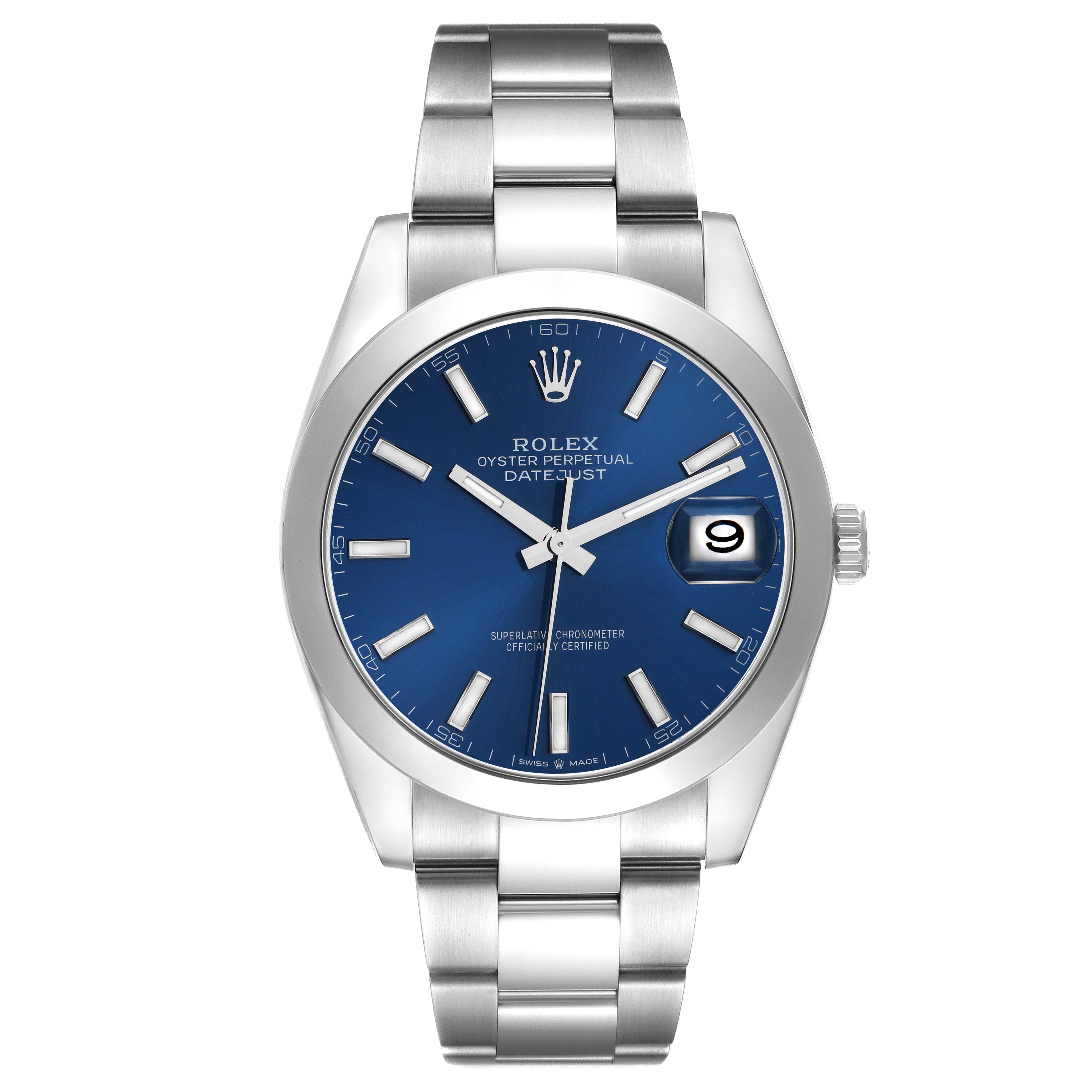 The Rolex Datejust 126300 Men
s Stainless Steel Blue Dial watch is shown from a front angle, displaying its blue dial, silver-tone hour markers, and metal bracelet.