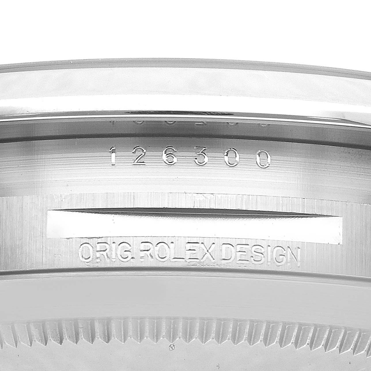 The image shows a close-up of the Rolex Datejust 126300 Men
s Stainless Steel Blue Dial
s case back, highlighting the model number and "ORIG. ROLEX DESIGN" engraving.