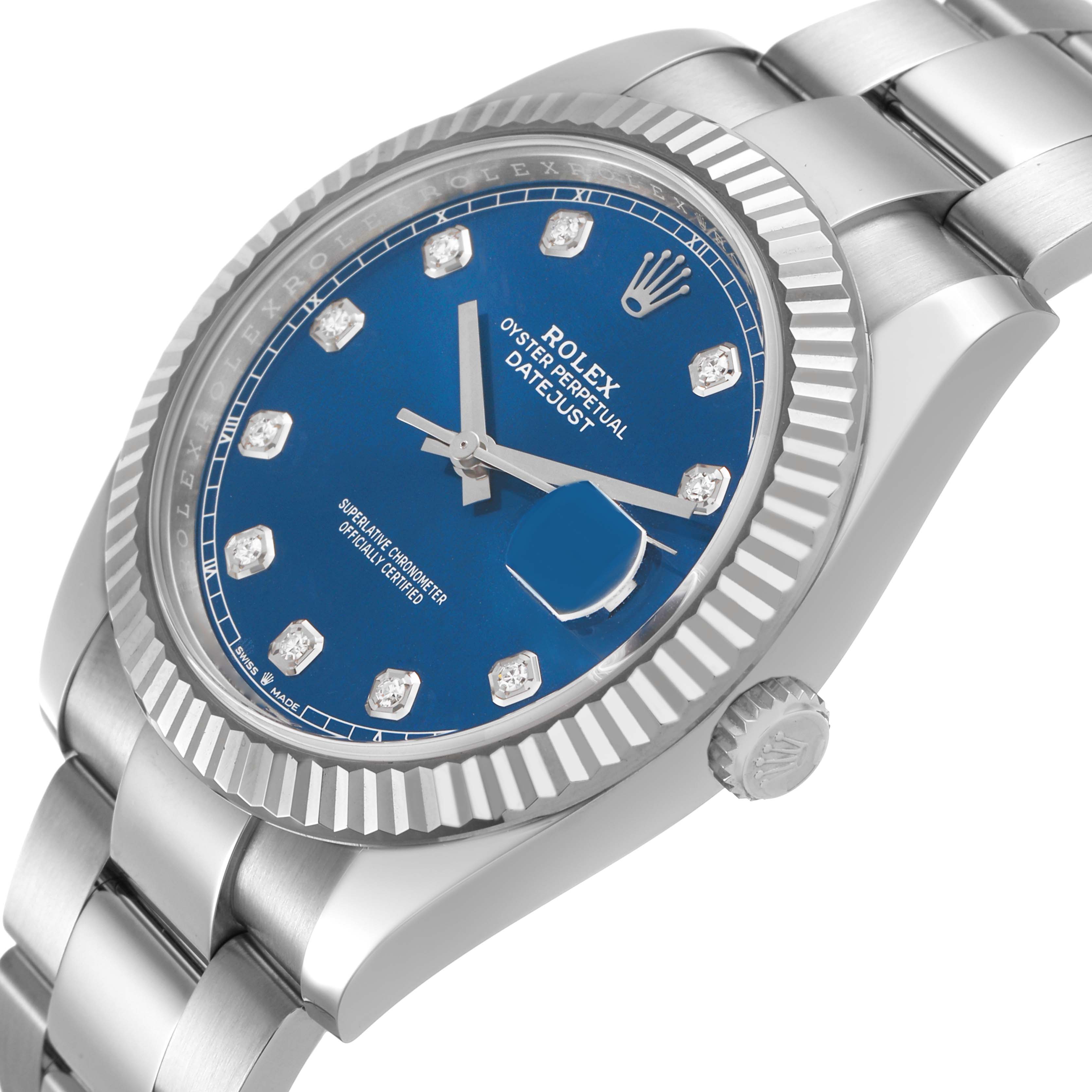 The Rolex Datejust 41 126334 Men's Steel and Gold (two tone) Blue Dial is shown in a side-angle view, highlighting the blue dial, fluted bezel, crown, and part of the bracelet.