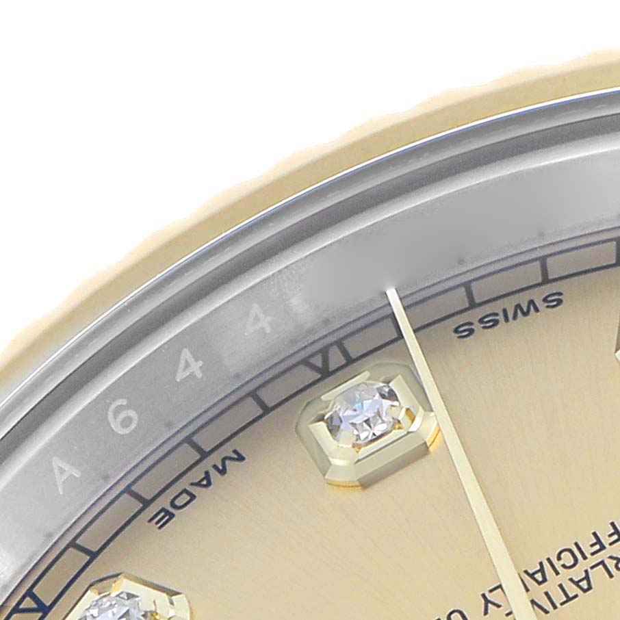 The image shows a close-up of the dial and bezel of a Rolex Datejust 116333 Men
s Steel and Gold (two tone) Champagne Dial, highlighting the hour markers and text details.