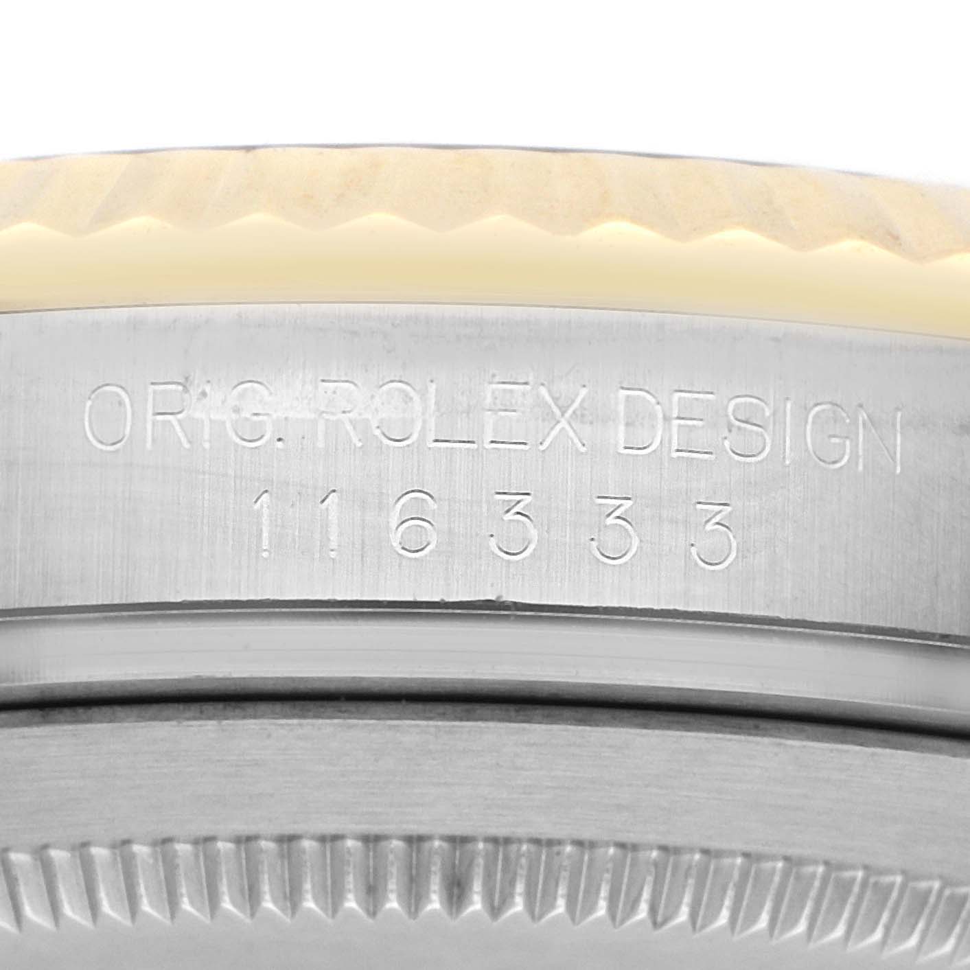 The image shows a close-up angle of the case side of a Rolex Datejust 116333 Men
s Steel and Gold (two tone) Champagne Dial, highlighting the engraved reference number.