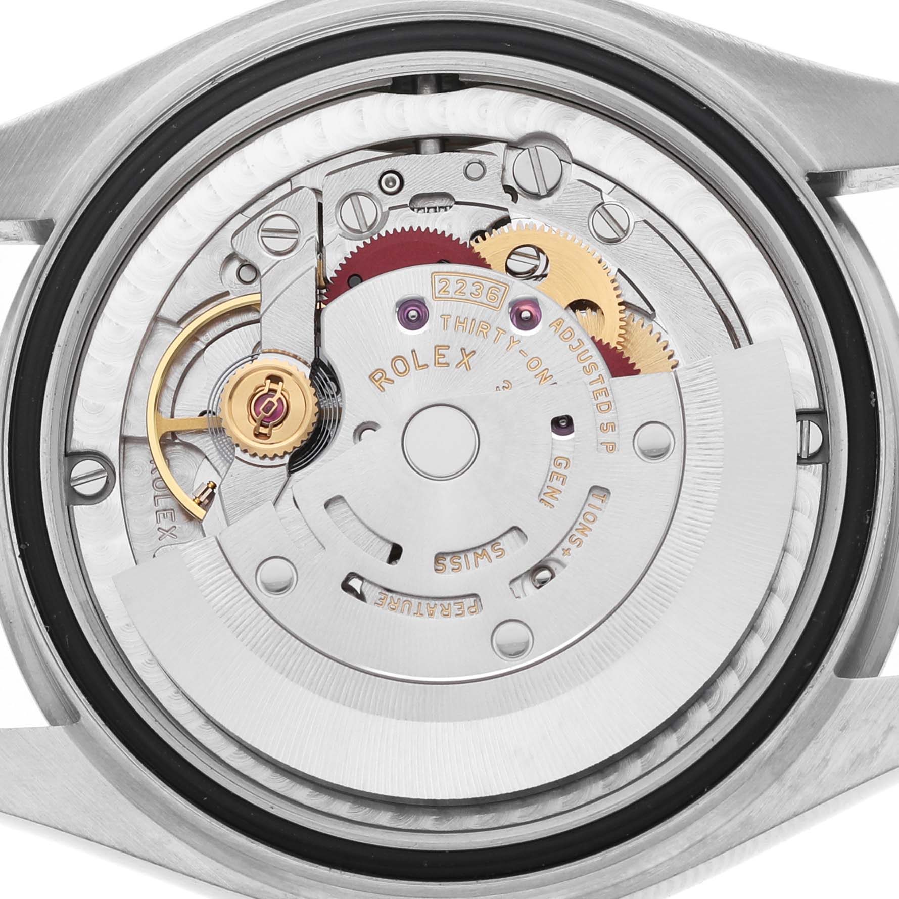 The image shows the movement and mechanical inner workings of a Rolex Datejust 278274 Women's Stainless Steel Purple Dial watch from a rear angle.