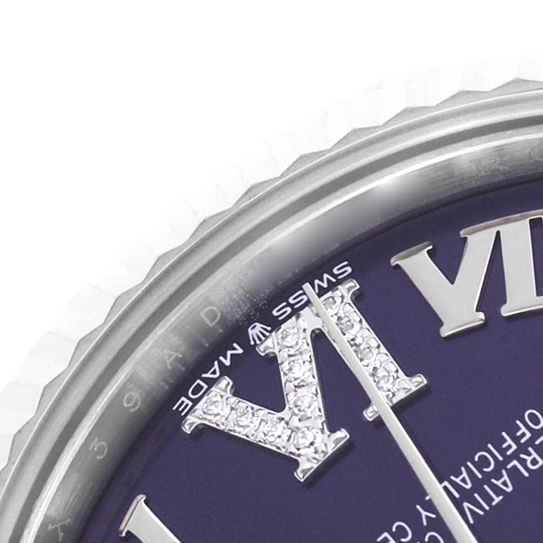 The image shows a close-up of a Rolex Datejust 278274 Women's Stainless Steel Purple Dial watch face, focusing on the bezel, Roman numeral VI with diamonds, and part of the dial.