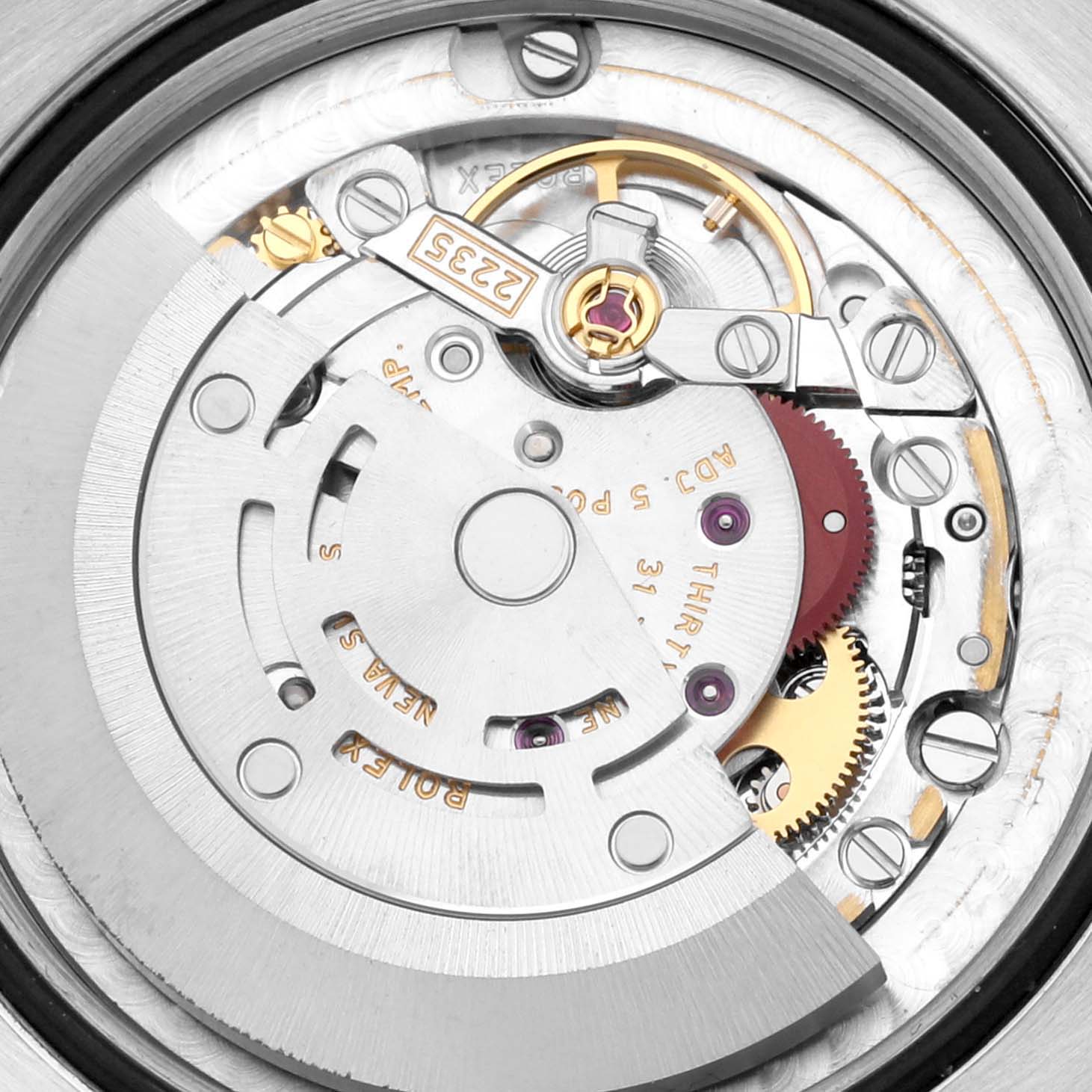 This image shows the internal mechanical movement of the Rolex Mid-Size 178383 Women's Steel and Gold (two tone) Mother of Pearl Dial 178383 Women's Steel and Gold (two tone) Mother of Pearl Dial watch, focusing on gears and other components.