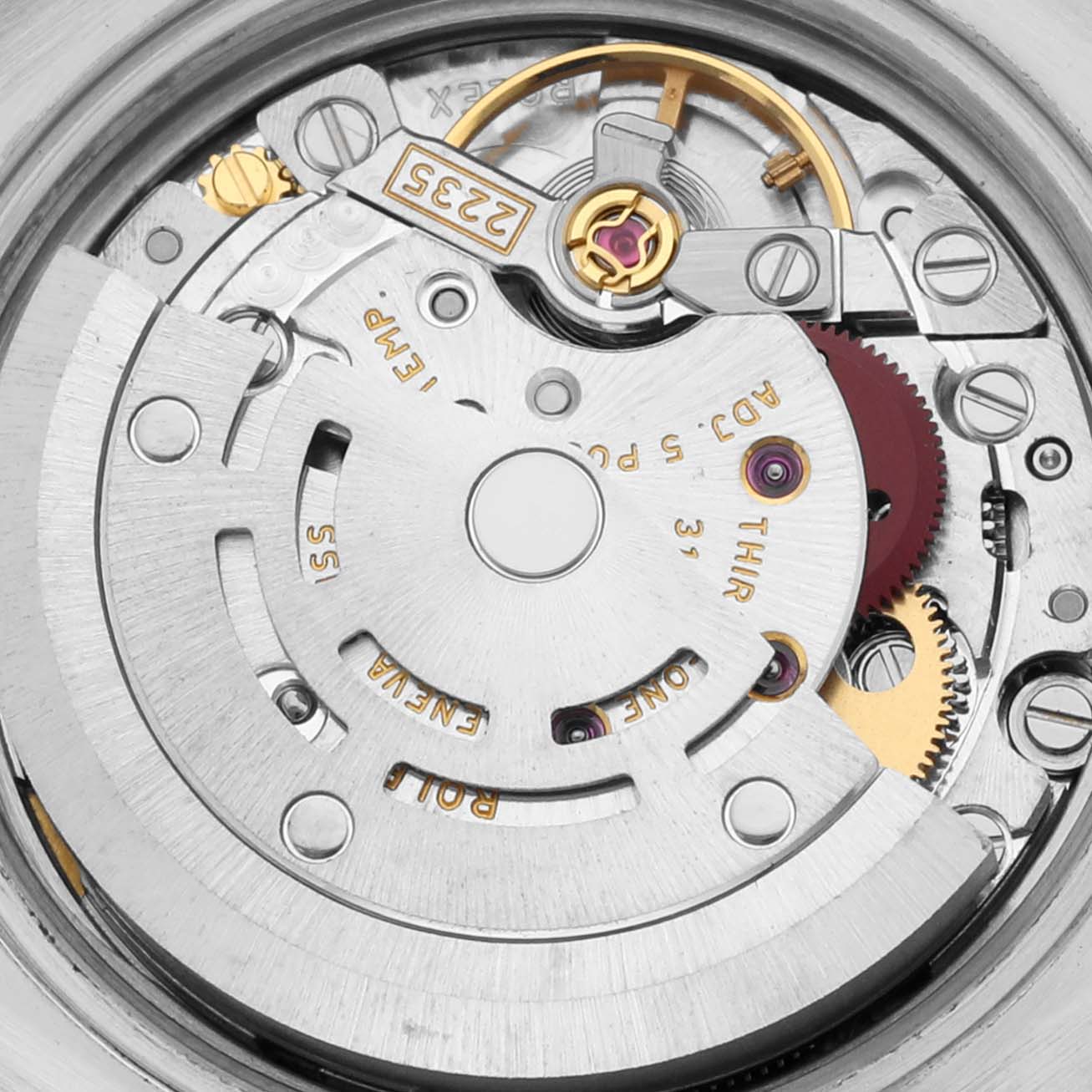 The image shows a close-up view of the intricate automatic movement inside a Rolex Datejust 179171 Women's Steel and Gold (two tone) Mother of Pearl Dial 179171 Women's Steel and Gold (two tone) Mother of Pearl Dial watch.