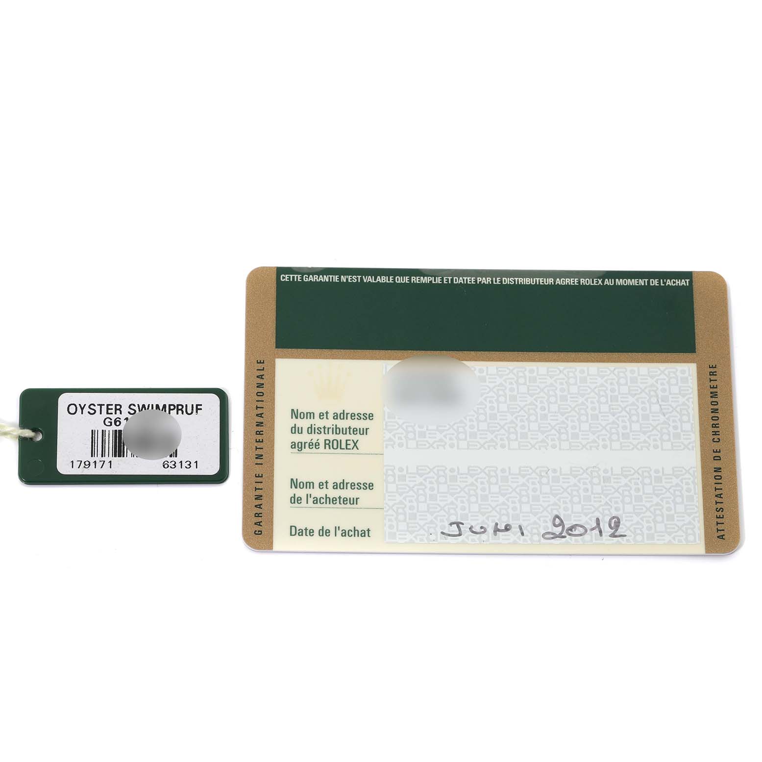 This image shows a Rolex Oyster Swimpruf tag and a Datejust model warranty card.