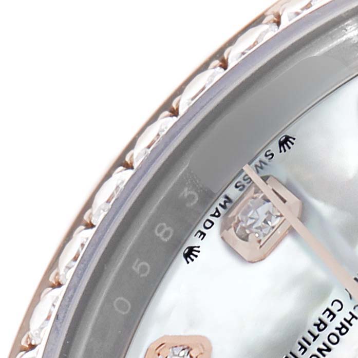 The image shows a close-up of the bezel, dial edge, and hour markers of a Rolex Datejust 279381 Women's Stainless Steel Mother of Pearl Dial watch.