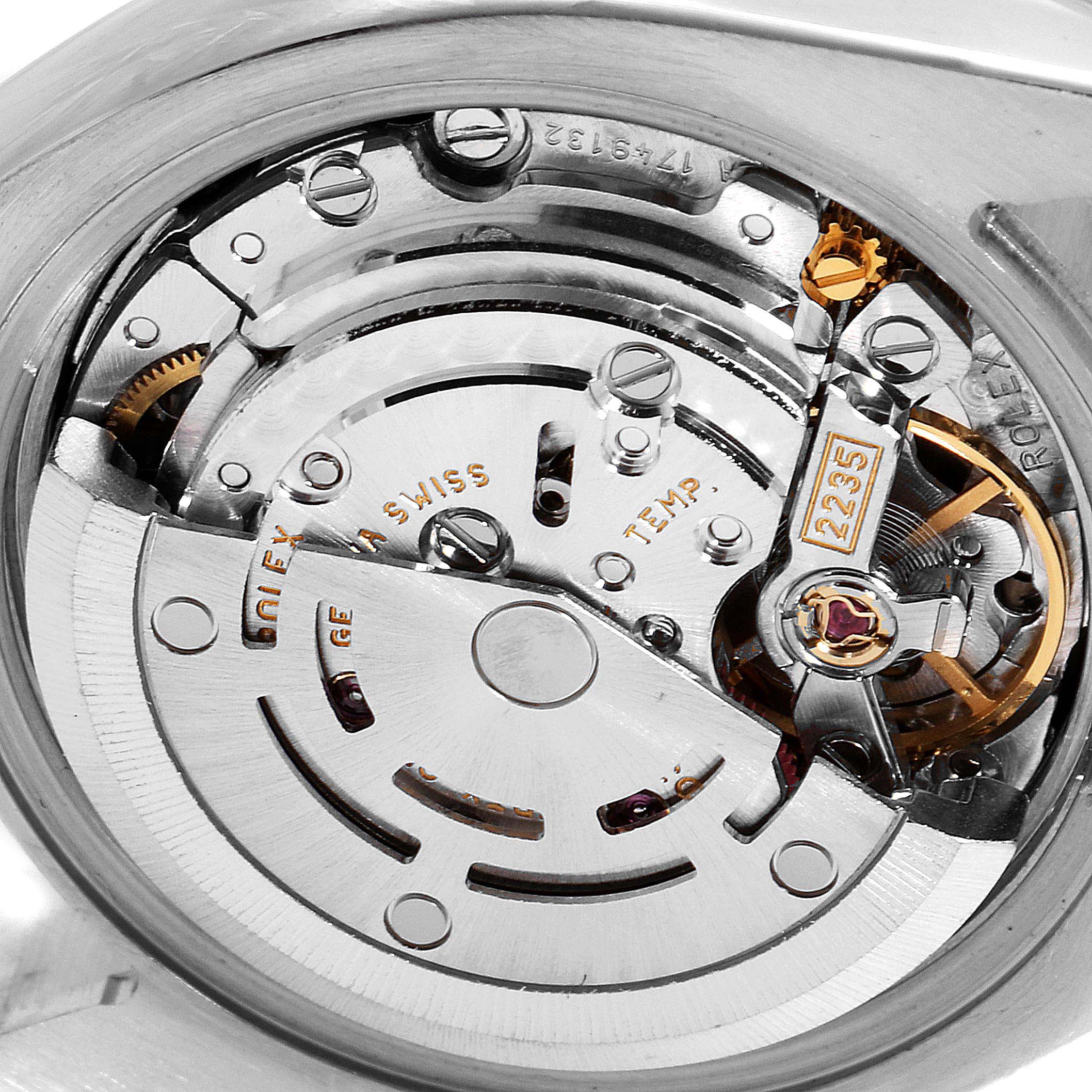 This image shows a close-up of the inner mechanism of a Rolex Datejust 179174 Women's White Gold Black Dial 179174 Women's White Gold Black Dial watch.