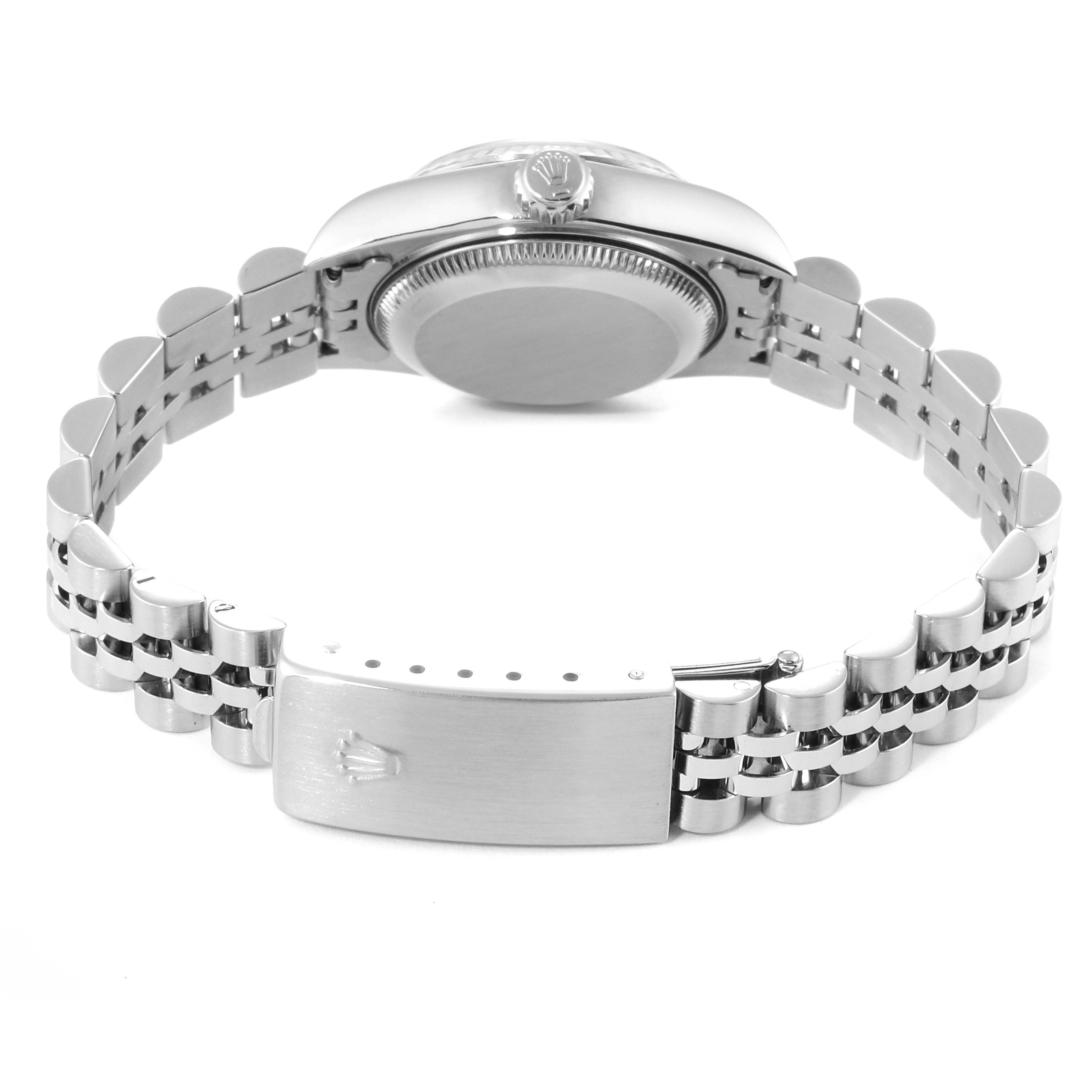 The image shows the back and clasp of a Rolex Datejust 79174 Women
s Stainless Steel Mother of Pearl Dial 79174 Women
s Stainless Steel Mother of Pearl Dial watch, focusing on its bracelet and case back.