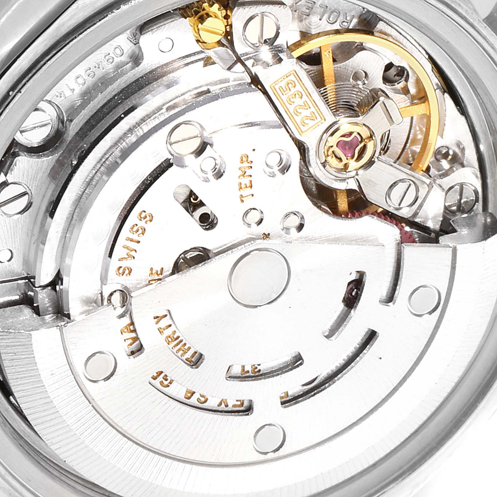 This image shows a detailed view of the movement mechanism inside a Rolex Datejust 79174 Women
s Stainless Steel Mother of Pearl Dial 79174 Women
s Stainless Steel Mother of Pearl Dial watch.