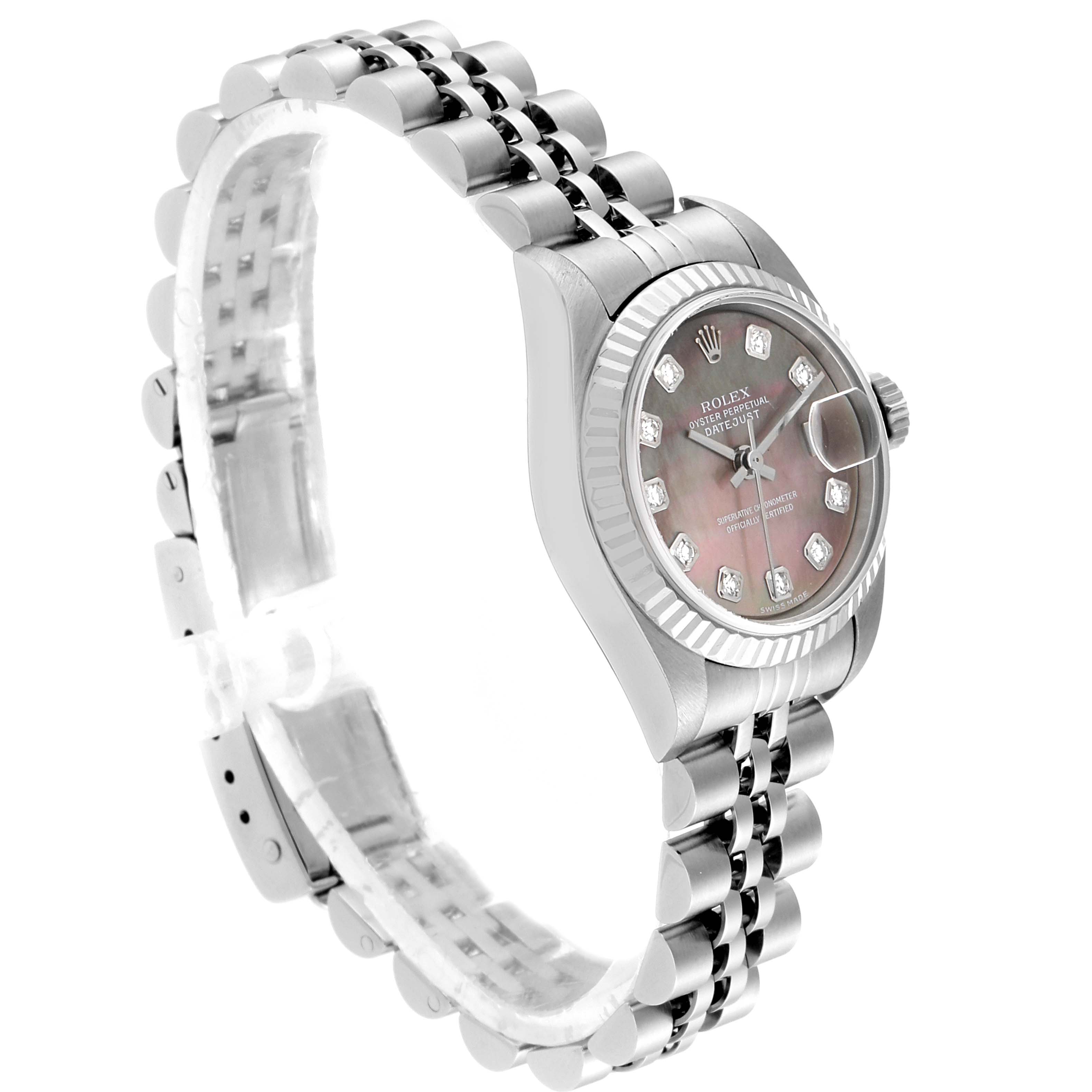 The Rolex Datejust 79174 Women
s Stainless Steel Mother of Pearl Dial 79174 Women
s Stainless Steel Mother of Pearl Dial watch is shown at a slight angle from the side, highlighting the band and face.