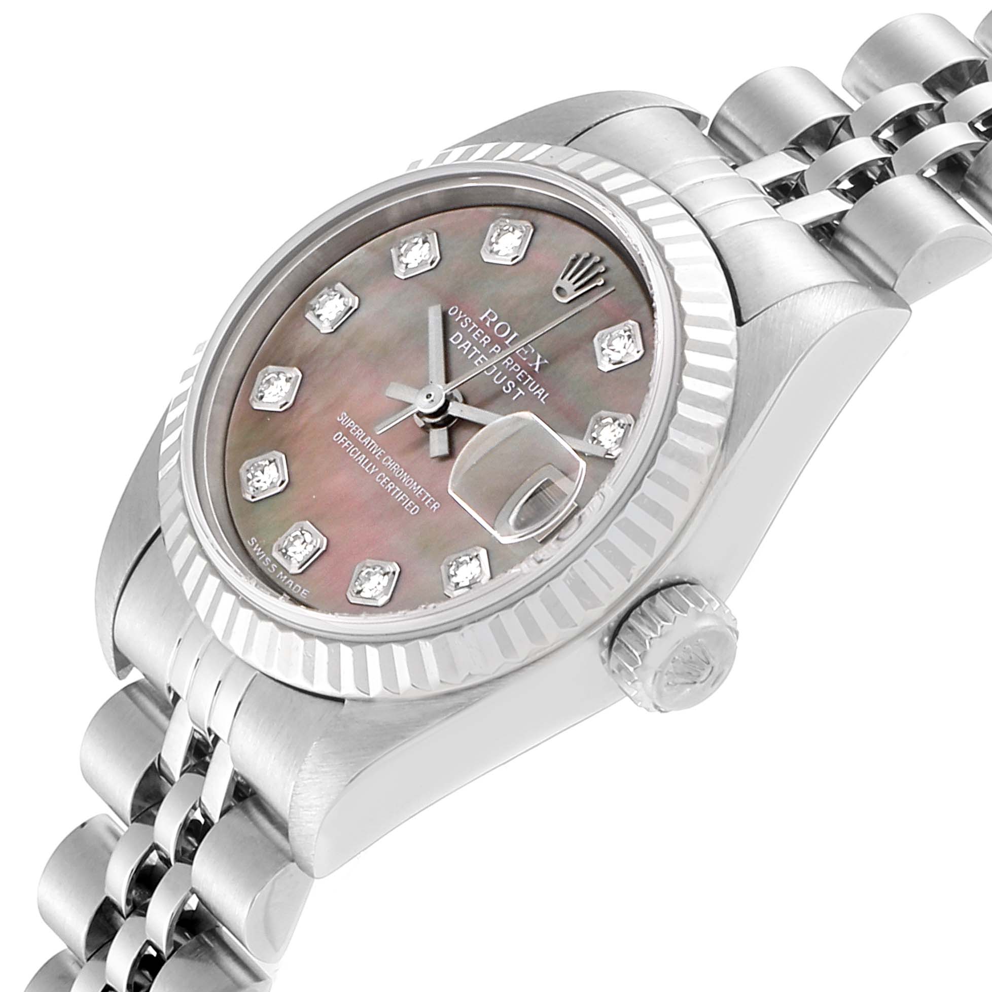 This image shows a close-up angled view of the Rolex Datejust 79174 Women
s Stainless Steel Mother of Pearl Dial 79174 Women
s Stainless Steel Mother of Pearl Dial watch
s dial, crown, and part of the bracelet.