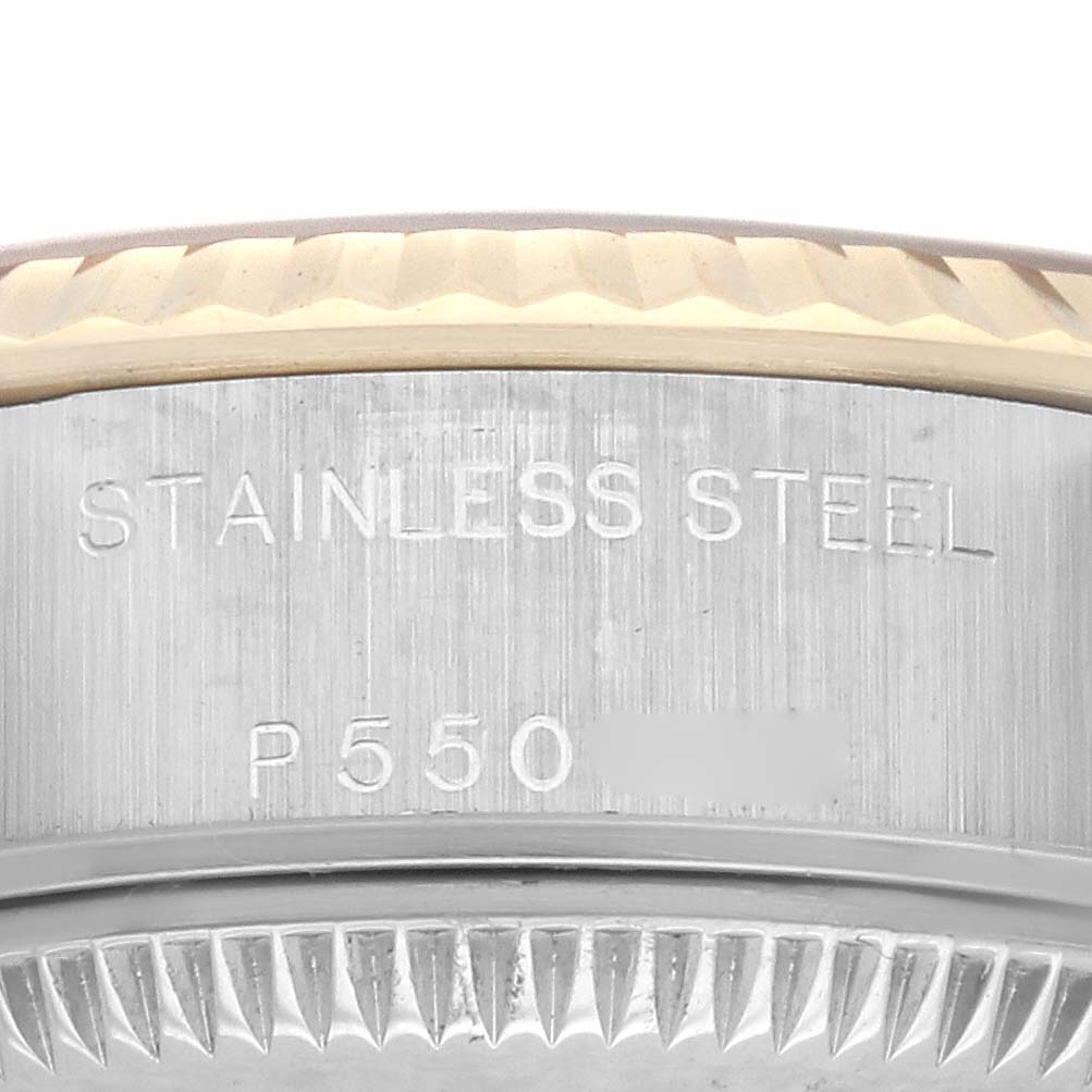 This close-up image shows the engraved markings on the stainless steel case side of the Rolex Datejust 79173 Women's Steel and Gold (two tone) Champagne Dial 79173 Women's Steel and Gold (two tone) Champagne Dial watch.